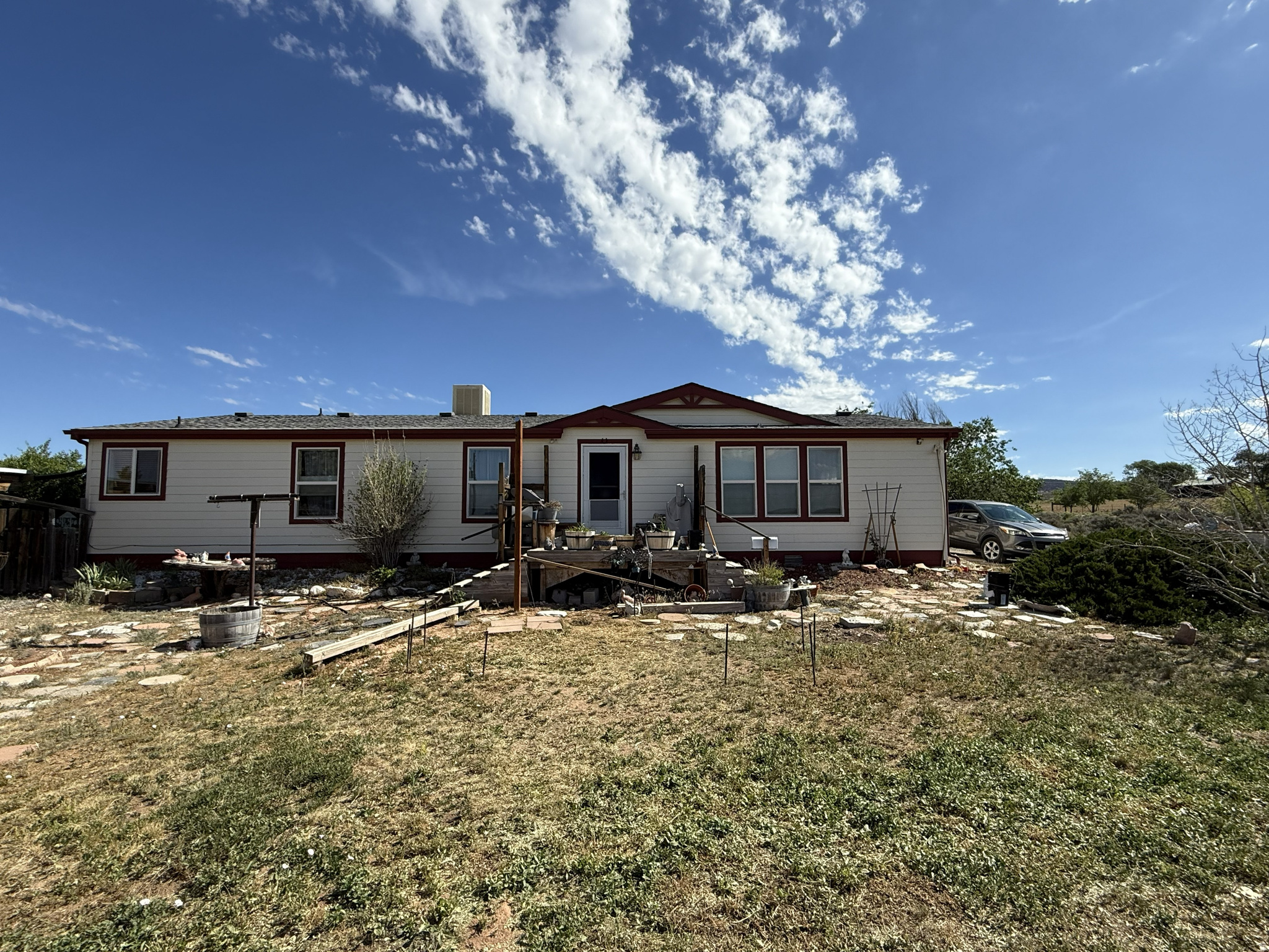 Country Living with Investment Potential in Beautiful La Sal, Utah! Escape to the peace and quiet of La Sal with this inviting 3-bedroom, 2-bath home situated on 1.5 acres of usable land. The spacious primary suite features a recently remodeled en-suite bathroom, offering modern comfort and style. Enjoy the reliability of a private well that is only 5 years old, providing an excellent water source for the property. Outside, you'll find plenty of room for animals, equipment, recreational vehicles, or future projects. The property also includes a large shop, perfect for storage, hobbies, woodworking, mechanics, or a variety of personal uses. Located in the heart of La Sal, this property offers easy access to some of southeastern Utah's most sought-after outdoor destinations. With its proximity to Moab, the La Sal Mountains, hiking trails, off-road recreation, hunting areas, and year-round outdoor adventures, this home may present an excellent opportunity as a vacation getaway or short-term rental investment (subject to local regulations and permitting requirements). Whether you're looking for a full-time residence, seasonal retreat, or an income-producing property, this home offers the space, privacy, and location to make it a standout opportunity. Property Features: 3 Bedrooms | 2 Bathrooms Remodeled Primary En-Suite Bathroom 1.5 Acres Private Well (Only 5 Years Old) Large Shop Ample Room for RVs, Equipment, and Recreation Convenient Access to Moab and the La Sal Mountains Potential Vacation Rental or Outdoor Recreation Basecamp Enjoy mountain views, open skies, and the outdoor lifestyle that makes La Sal one of Utah's hidden gems.     Square footage figures are provided as a courtesy estimate only and were obtained from County Records .  Buyer is advised to obtain an independent measurement.