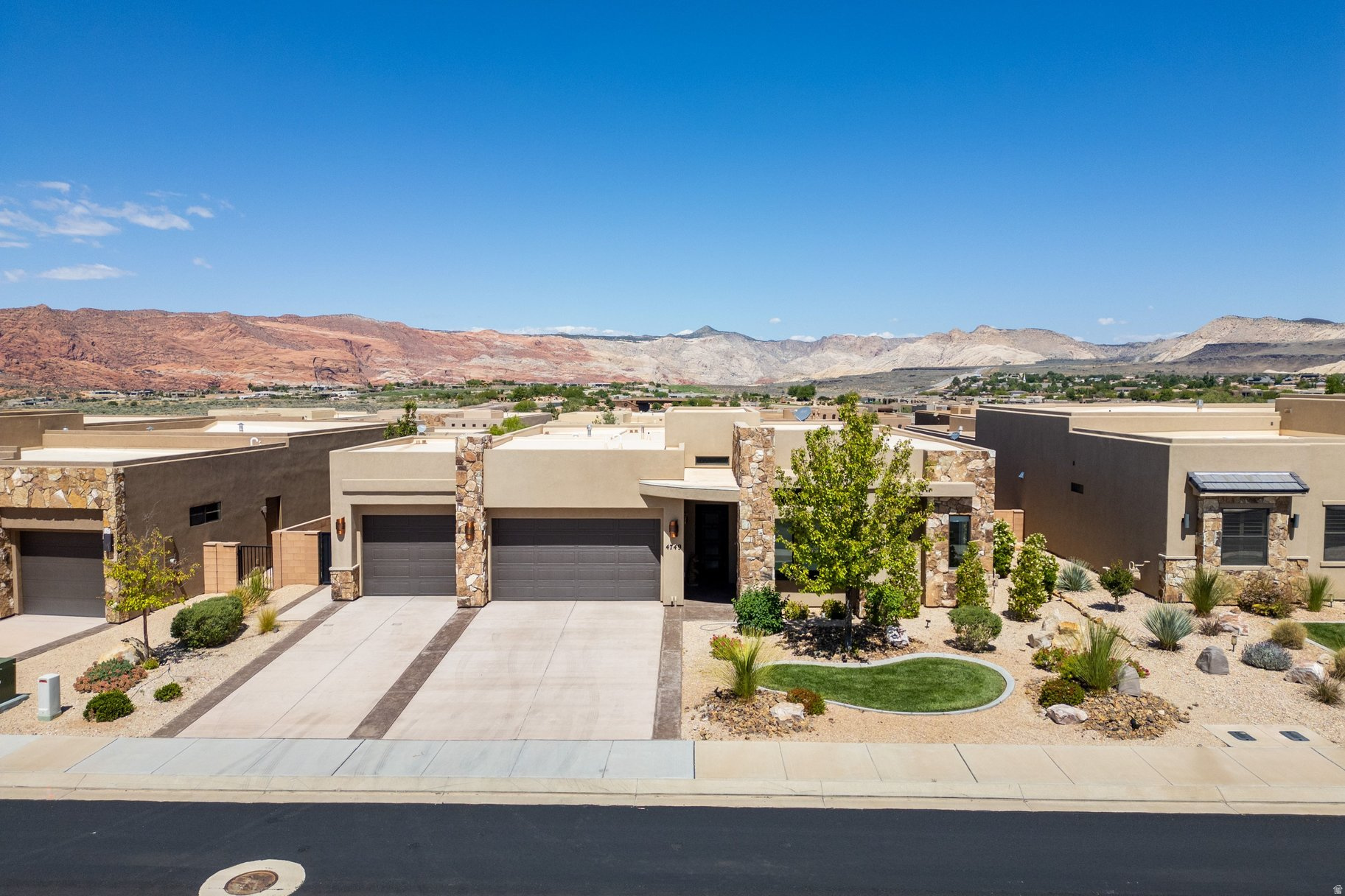 Located in the highly desirable The Ledges of St. George, this 4-bedroom, 2-bath home offers a clean, move-in-ready feel with fresh interior paint and brand-new carpet throughout. The open, functional layout is designed for easy everyday living and comfortable entertaining.  Just minutes from the golf course and surrounded by one of St. George's premier communities, this home is a great fit for a full-time residence or a low-maintenance second home-with a touch of Snow Canyon scenery to top it off.