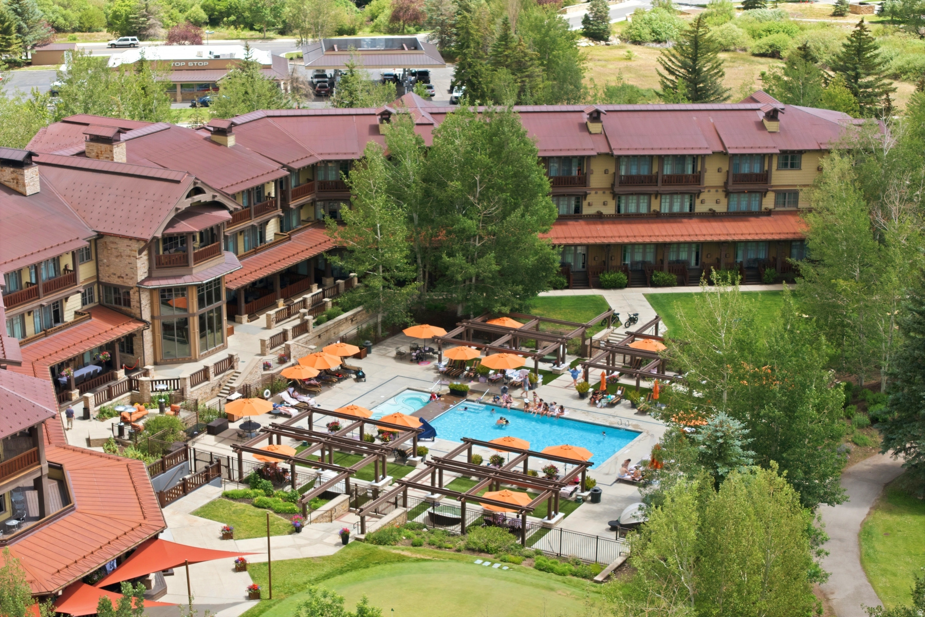 Super rare and sought after Grand Luxury Suite at the amazing Hotel Park City! One of the best locations in the building with stunning views of Park City Ski Resort, Park City Golf Course, and pool area.  There are no units beside or below you, so you get privacy and ease of access being close to the lobby and amenities. This unit is larger than most 2 bedrooms! It has a large open kitchen, dining, living room area and 3/4 bath and desk area with access to the large deck to enjoy the views.  Then a separate large bedroom with walk-in closet and full bathroom. There is even a locked owner closet to store things!  Comes with everything you need, just bring your suitcase and relax! Park City Hotel is known for its great location next to the Park City golf course and close to ski resorts, Main Street, restaurants, and grocery stores.  It is a Marriott Autograph Collection Hotel with pools, spa, gym, Ruth Chris Steak House, Bandanas Cafe, bell staff, housekeeping, valet, and hotel shuttle to take you to Main Street and ski resorts
