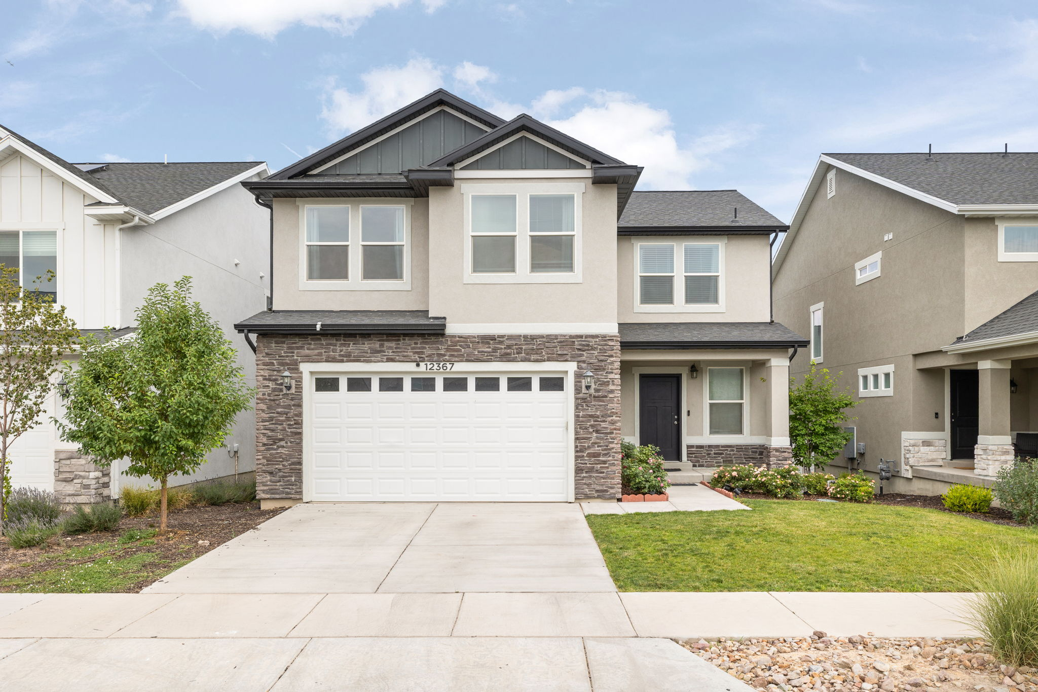 Welcome to this well maintained home in the heart of Herriman. Featuring four-bedrooms and laundry on the upper level, providing the ideal layout for families who want everyone on the same floor or need a little extra space for a home office. The spacious primary suite offers a private retreat with vaulted ceilings, a large walk-in closet, dual vanities, and a separate soaking tub and shower. The main floor with laminate flooring throughout and an open concept kitchen, dining, living area, that opens directly to a the fully fenced backyard makes for the perfect place to entertain year round. Downstairs, the recently finished basement adds versatility with two additional bedrooms, a second kitchen, and generous living space, perfect for multi-generational living, extended guests, or the potential to create a rental suite for added income. Step outside to enjoy the raised garden beds, offering the perfect place to grow fresh vegetables, herbs, or colorful flowers while enjoying the peaceful backyard. With six total bedrooms, multiple living spaces, and exceptional flexibility, this home is a rare opportunity to own a property that adapts to your lifestyle today while offering investment potential for tomorrow.  Square footage figures are provided as a courtesy estimate only. Buyer is advised to verify all information contained in listing.
