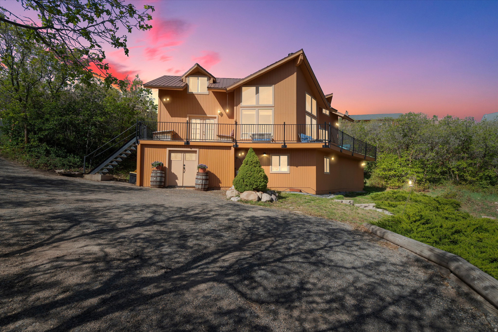 Enjoy unmatched privacy, space, and breathtaking panoramic mountain and reservoir views from this secluded mountain retreat. Vaulted ceilings, expansive windows, and a finished basement featuring a theater room and pool table create the perfect setting for entertaining or relaxing year-round. Thoughtful updates include refinished decking, updated bathrooms, new knotty alder doors, custom mudroom built-ins, and major system upgrades including a new water heater, water pump, and pressure tanks. Spend your summers on the lake and be on the slopes of Park City in just 25 minutes, all while enjoying the peace, privacy, and recreation this exceptional property has to offer. Square footage figures are provided as a courtesy estimate only and were obtained from the seller. Buyer is advised to obtain an independent measurement and verify all information.