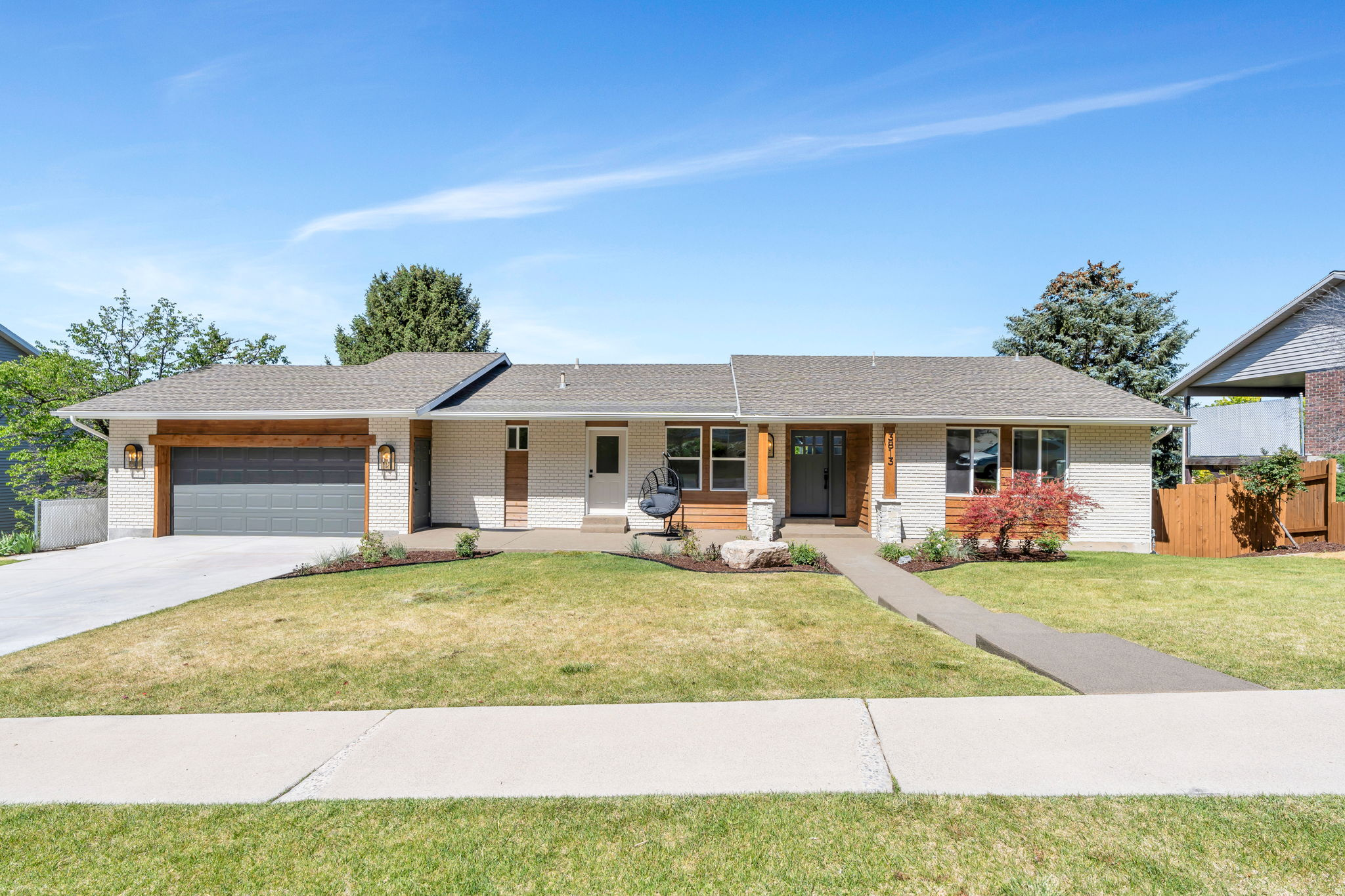 Beautifully updated east bench home in Provo offering ideal multigenerational living with separate main floor and basement walk-out living spaces. The main level features 3 bedrooms, 2.5 bathrooms, laundry, updated kitchen, spacious living and dining areas, and abundant natural light throughout. The fully finished walk-out basement includes 3 additional bedrooms, 2 bathrooms, full kitchen, laundry, dining and living areas, plus a game room-perfect for extended family, guests, or rental potential. Enjoy stunning mountain and lake views from the deck and patio. Additional features include a 2-car garage, 2 storage sheds, and a highly desirable Provo east bench location. Square footage figures are provided as a courtesy estimate only and were obtained from County Records. Buyer to verify all.