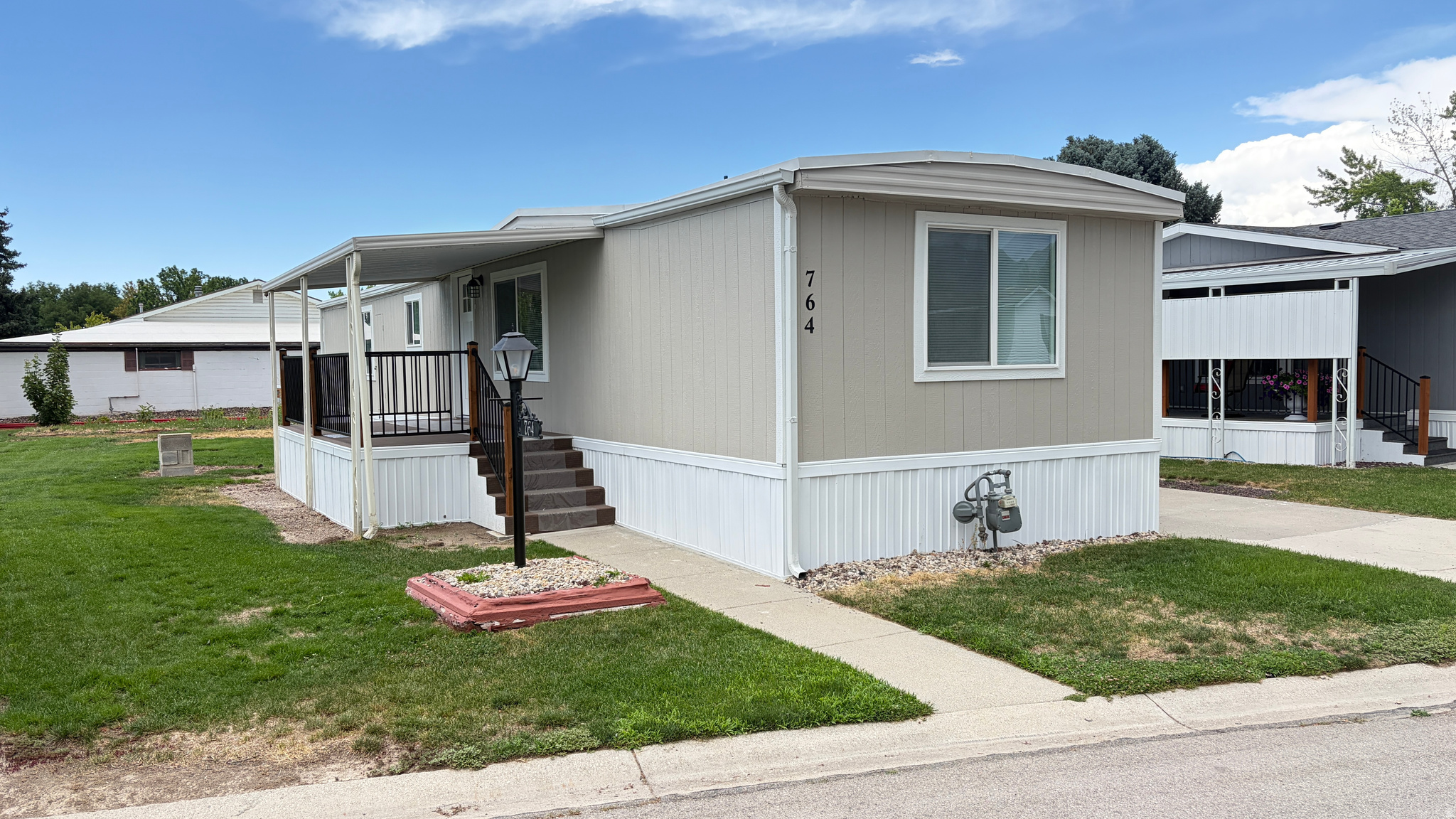 Completely remodeled top to bottom! This home shines in the well-kept Monte Vista 55+ community, centrally located in the SL Valley. New roof, windows, exterior, decks/railings, electrical, plumbing & floors. New cabinets & granite in kitchen & both baths; master has walk-in shower & closet. Vaulted living room, new carpet, stainless appliances, awnings over deck & carport. Won't last-see it today!