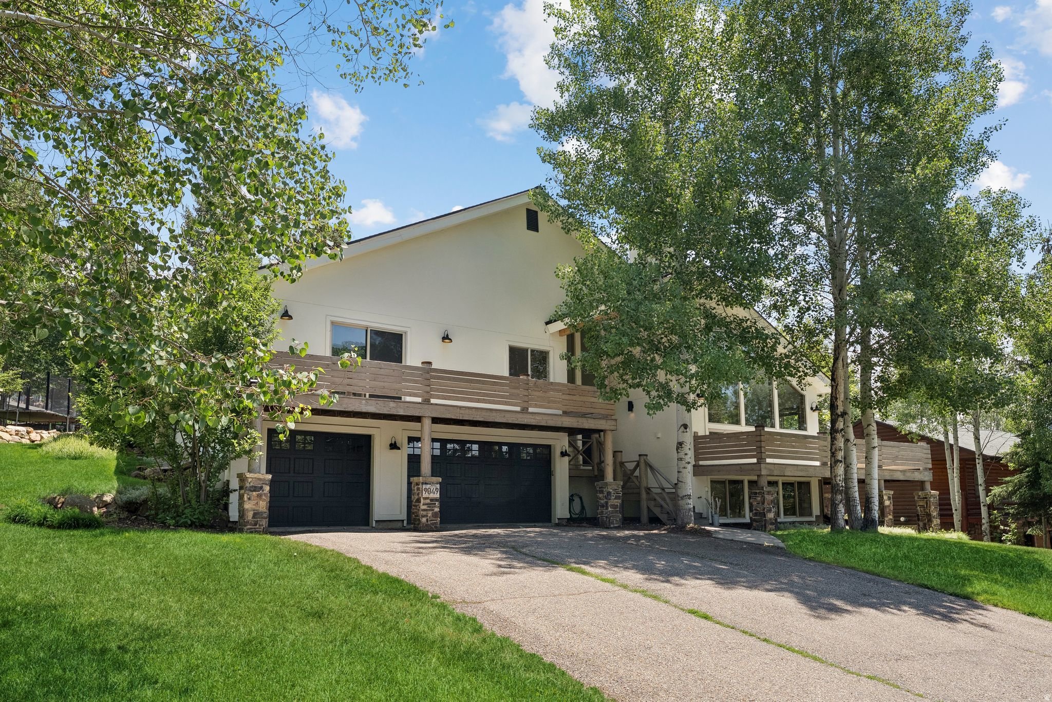 Mountain Views  Modern Upgrades  Designed for Everyday Living  Located in the highly sought-after Jeremy Ranch neighborhood, this beautifully upgraded 5-bedroom, 5-bathroom home offers the perfect blend of comfort, functionality, and mountain views in a fantastic family community. The open floor plan connects the main living spaces, making everyday living and entertaining effortless. Recent upgrades include fresh exterior paint, updated deck railings, a chef-inspired kitchen, and a spa-like primary bathroom. Multiple living areas provide plenty of space for everyone, including two family rooms and a flexible lower-level space ideal for a home gym, office, or playroom. South-facing windows fill the home with natural light and frame stunning mountain views throughout. This Park City home combines thoughtful upgrades, versatile living spaces, and an exceptional setting in one of the most welcoming neighborhoods.