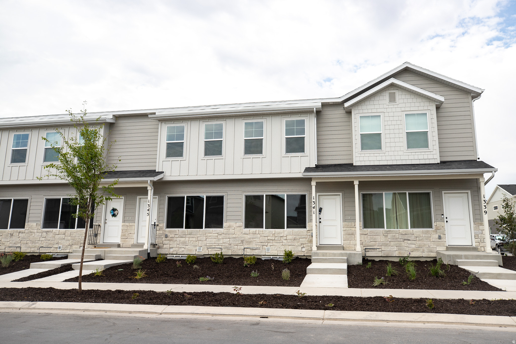 AMAZING $10,000 INCENTIVE TOWARDS CLOSING COSTS, RATE BUYDOWN, OR PRICE REDUCTION REGARDLESS OF LENDER! Plus, this home qualifies for Utah's First-Time Homebuyer Program-giving you up to AN ADDITIONAL $20,000 for down payment, closing costs, or interest rate buydown! Must-see Harmony Community in Eagle Mountain! This beautiful interior unit townhome built by Flagship Homes has great natural light and 9' ceilings on top 2 floors. This townhome features 3 bedrooms, 3 bathrooms, a finished basement, quartz slab countertops, painted cabinets, laminate flooring on the main level, 1 car garage with an extended driveway for extra parking and full landscaping. The primary bedroom has a large walk-in closet with dual sinks in the primary bathroom. It also has a full-size laundry room. This townhome is move-in ready. Call for more information or stop by our model home at 1546 E. Starling Lane, Eagle Mountain for a tour. Model home hours: Monday-Saturday 11 AM - 6 PM. Buyers to verify all information. Square footage is from house plans. PHOTOS are from a staged model and furniture NOT included with purchase.