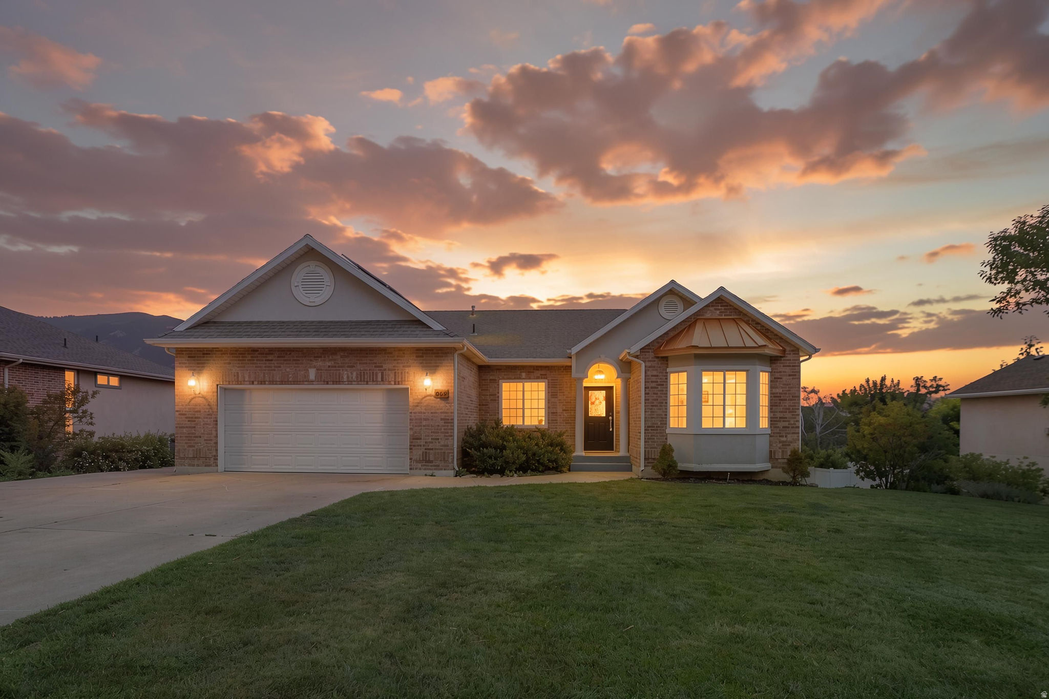 No showings until Open House on Saturday from 12pm-3pm. Welcome home to this beautiful 4-bedroom, 3-bathroom residence nestled in the heart of North Ogden, where breathtaking panoramic views of the Wasatch Mountains and the Ogden Valley create an incredible backdrop for everyday living. This well-maintained home features numerous upgrades, including granite countertops and brand-new carpet throughout the upstairs. The spacious floor plan offers generously sized bedrooms and plenty of room for the whole family. Downstairs, you'll find an expansive family room filled with natural light from oversized windows-making it the perfect space for entertaining, family gatherings, a game room, or your own private home theater. Step outside onto the spacious back deck or in the front living room and take in the unobstructed, million-dollar views with no homes blocking your sightline. Whether you're enjoying your morning coffee, watching the sunset, or entertaining guests, this outdoor space is sure to become a favorite. The lower patio features a relaxing hot tub, providing the perfect place to unwind while soaking in the spectacular mountain scenery. Outdoor enthusiasts will love the convenient access to several nearby trailheads offering some of the area's best hiking, biking, and recreation. Just minutes away, Mountain View Park provides endless opportunities for fun with its playground, large soccer fields, open green space, and public amenities. To top it all off, the home is equipped with solar panels that provide significant savings on monthly electric costs, with the solar system being negotiable with an acceptable offer.    Homes offering this combination of stunning views, spacious living, energy efficiency, and an unbeatable North Ogden location don't come along often. Schedule your private showing today!