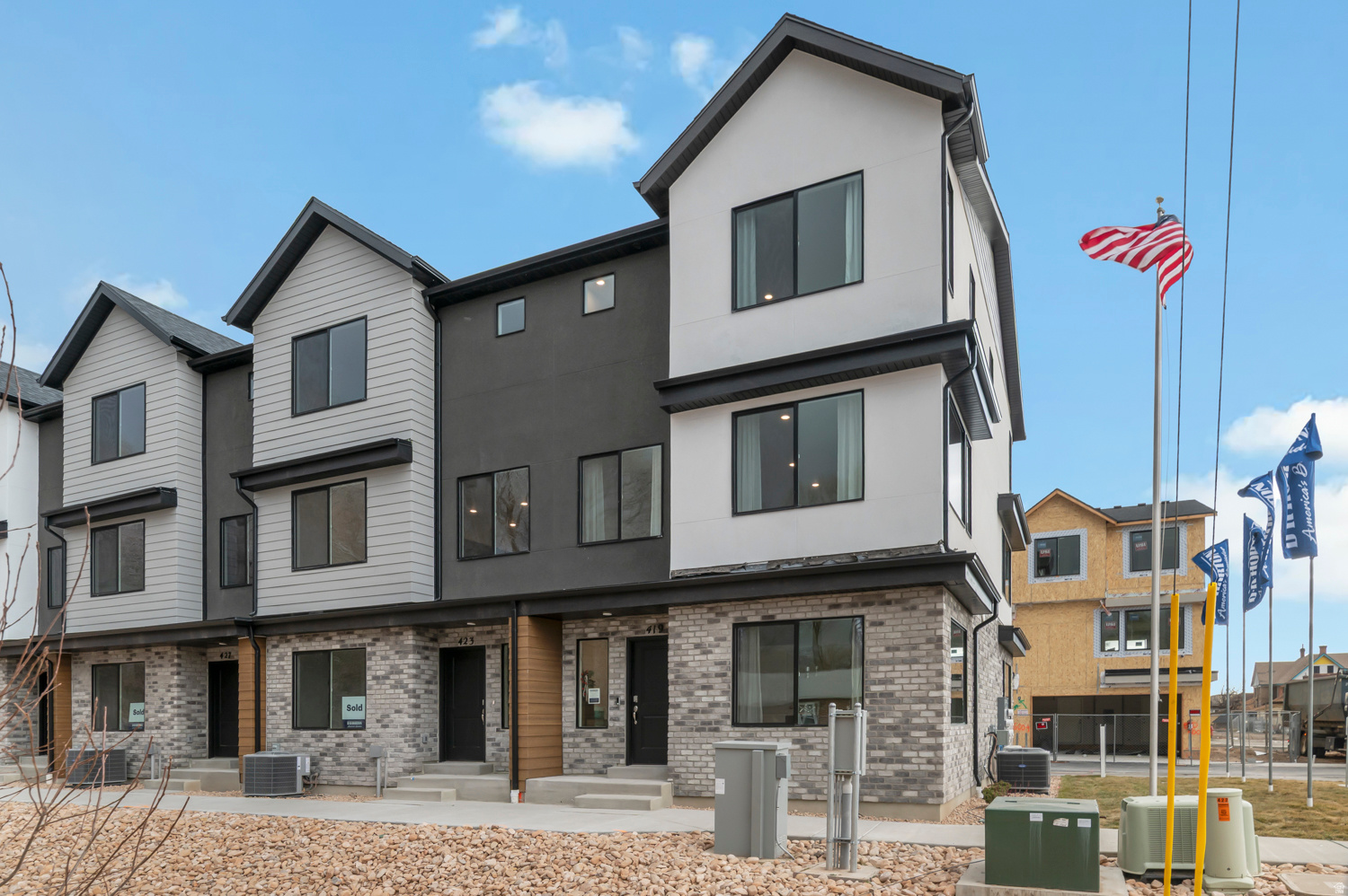 Set to complete end of October; Welcome to the Haven at Midtown Village in Ogden-an efficient 3-story townhome End-Unit offering 4 bedrooms, 3 bathrooms, and a 2-car garage. The entry level includes a private bedroom and full bath-ideal for guests or a home office. The open-concept main floor features a modern kitchen with a large island and stainless-steel appliances, flowing into the dining and family areas. Upstairs offers additional bedrooms, laundry, and a spacious primary suite with walk-in closet and private bath. Enjoy low-maintenance living with HOA-maintained landscaping-schedule your showing today! ***ASK ME ABOUT THE BELOW MARKET INCENTIVE RATES with our preferred lender + $$$ towards Closing costs! *** No representation or warranties are made regarding school districts or assignments. Photos may be of a similar home. Buyers to verify all colors, materials, options, and square footage, which is provided as an estimate from building plans. Sales Center Hours: Mon, Tue, Thu, Fri, Sat: 11 AM  6 PM Wed: 1 PM  6 PM | Closed Sun Call to schedule your visit!
