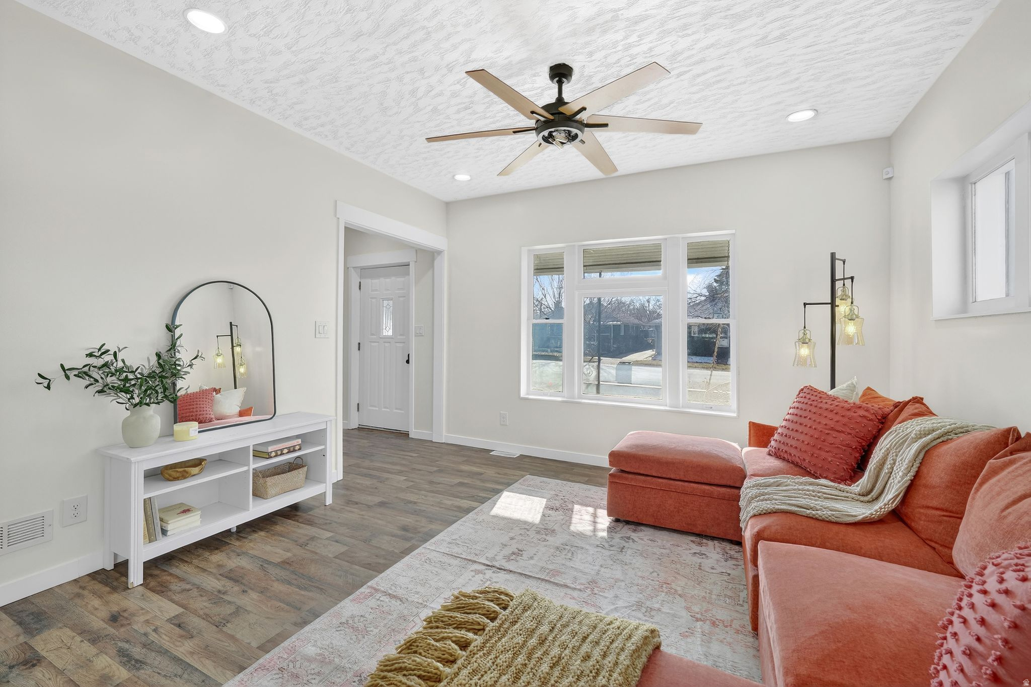 Buyer's financing fell through. Your chance to grab this gem! The perfect blend of vintage character and modern comfort. Original architectural details, including the staircase. The uniquely high ceilings create an open, welcoming feel throughout. Spacious layout with plenty of storage. Privacy fence including a complete dog run or area for other animals. A warm and inviting home with thoughtful details. Schedule a showing today!