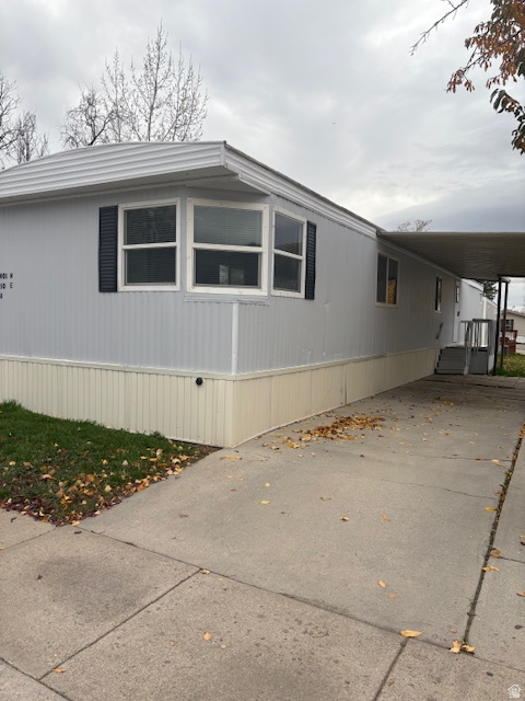 BRING ALL RESONABLE OFFERS SEELER NEEDS IT SOLD!!!!  This home has all new paint and new flooring with 3 bedrooms 2 bathrooms covered deck and covered parking  in a family friendly mobile home park. Close to shopping, schools, dinning. To view this home call agent for an appointment home is vacant and easy to show Seller will  lease to buy