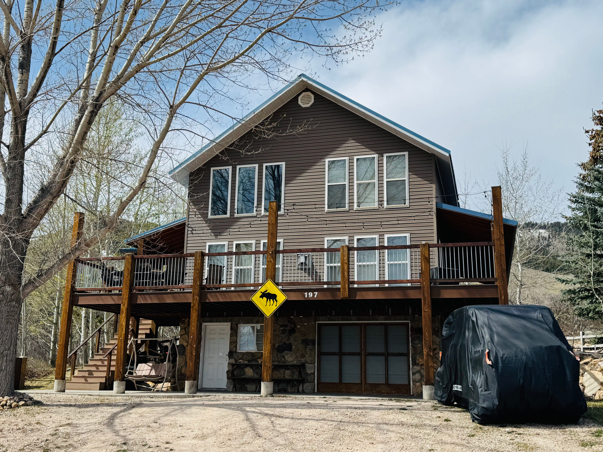 Come see this well maintained charming cabin! This property features secluded yard with mature trees, mountain and lake  views,  low maintenance exterior, and beautiful wood work inside . Conveniently located near ATV and hiking trails and just minutes away from beaches and State Marina.