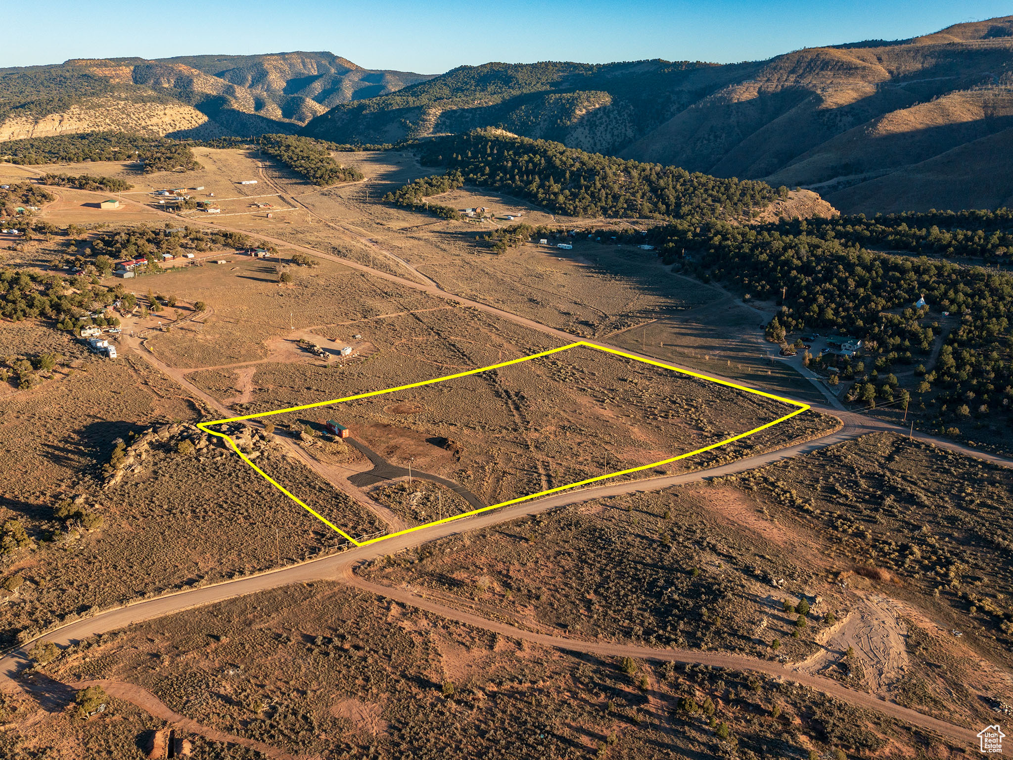 * Beautiful 5 Acre Lot in Red Creek Ranches with ALL utilities hooked up!! * City Water, 200 Amp Power with a 30 amp & 50 amp plug for RV's and a fully approved Septic System approved for a 3bed 2 bath future home * Year-Round Access with county plowed roads * Brand new gravel driveway * Enough room to park several campers, create your own family resort or build your dream home! * Great horse property with pasture! * No HOA or CCR's * Included is a 40ft storage container with a wood burning stove, windows and doors installed! Perfect for storage or a place to stay warm while camping * Sweet boulders on the property and nice flat lot - easy to build or camp! * Bring your campers, your tents and all your toys! * Perfect place to park your boat while you're away from the lake * Wonderful location just 20 mins to Strawberry Reservoir, Starvation Reservoir and Current Creek! Many rivers and streams to fish! * Miles & miles of 4 wheeling roads to ride and explore! * Maps are not showing correct property lines - please ask for details property line is shifted to the east from the map*