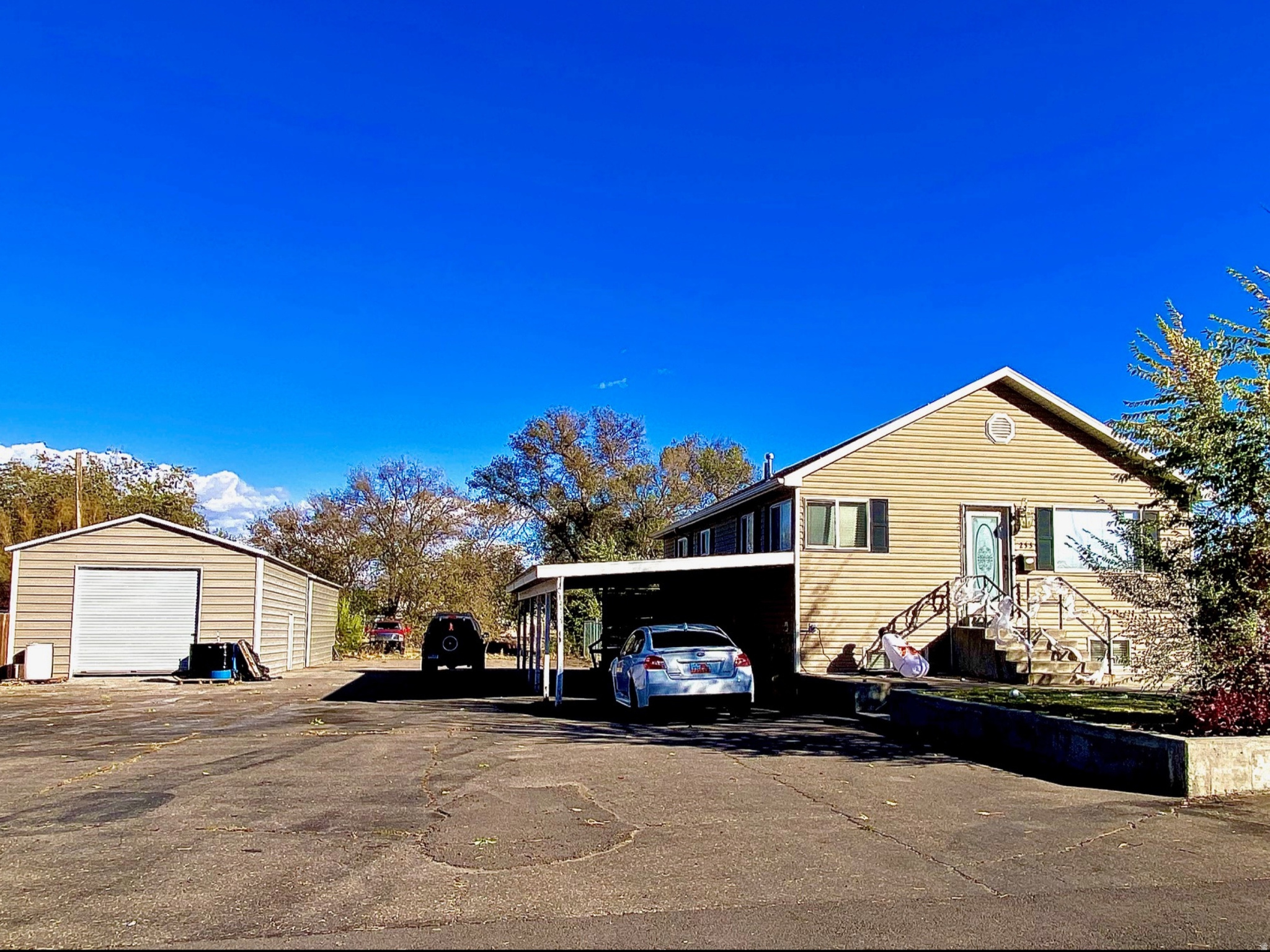 4 Bed 2 Bath remodeled home close to town. Enjoy the benefits of solar power, a large shop, and a carport that could easily be converted into another shop or workspace. Mailing Address is 255 S 100 E. Sq ft, Acres and taxes per county records. Buyer to verify all information.