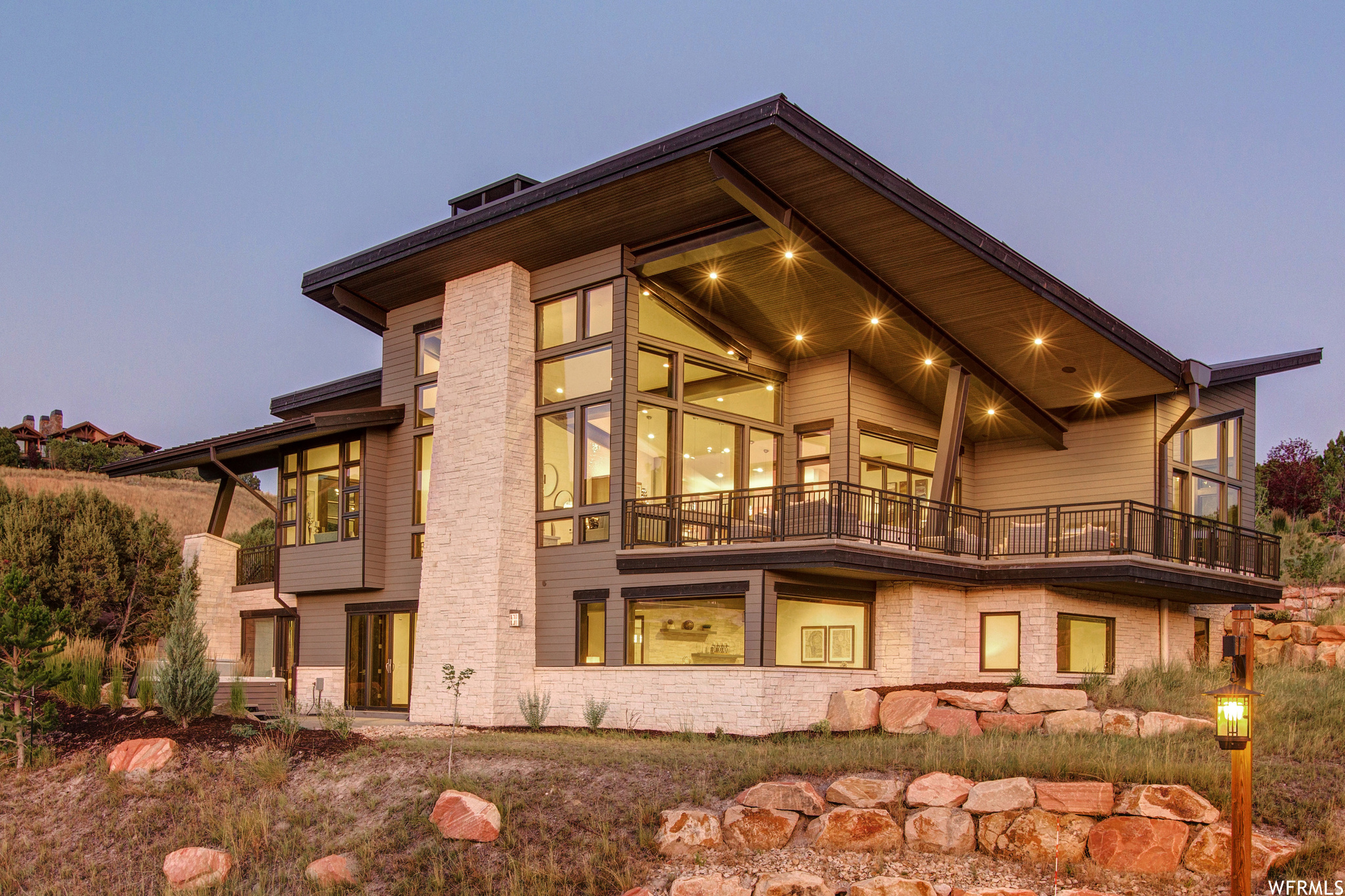 This Stunning Michael Upwall Designed contemporary home was in the Park City Showcase of Homes and boasts a mountain modern architecture combined with breathtaking panoramic views. Sitting the in private gated community of Red Ledges just north east of Heber City. This home is turn-key and fully furnished and decorated! Spacious 5 bedroom 5 bathroom home with luxurious finishes that include a gourmet kitchen with Wolf and Sub Zero appliances, steel architecture beams with giant custom windows with obstructed views of Heber Valley and the Wasatch Mountains. The master bedroom suite offers a custom walk in closet, fireplace, private deck and spa quality finishes in the bathroom. Family friendly features of the property include a home theater, hot tub, fire pit and custom built-in bunk room. The open kitchen and living area offer perfect harmony of comfort and luxury living. With a comfortable environment warmed by plenty of nature light and Natural stone fireplaces this is the prefect spot regardless of season. Sit in your private hot tub looking over the valley and make all of your Utah life style dreams come true.