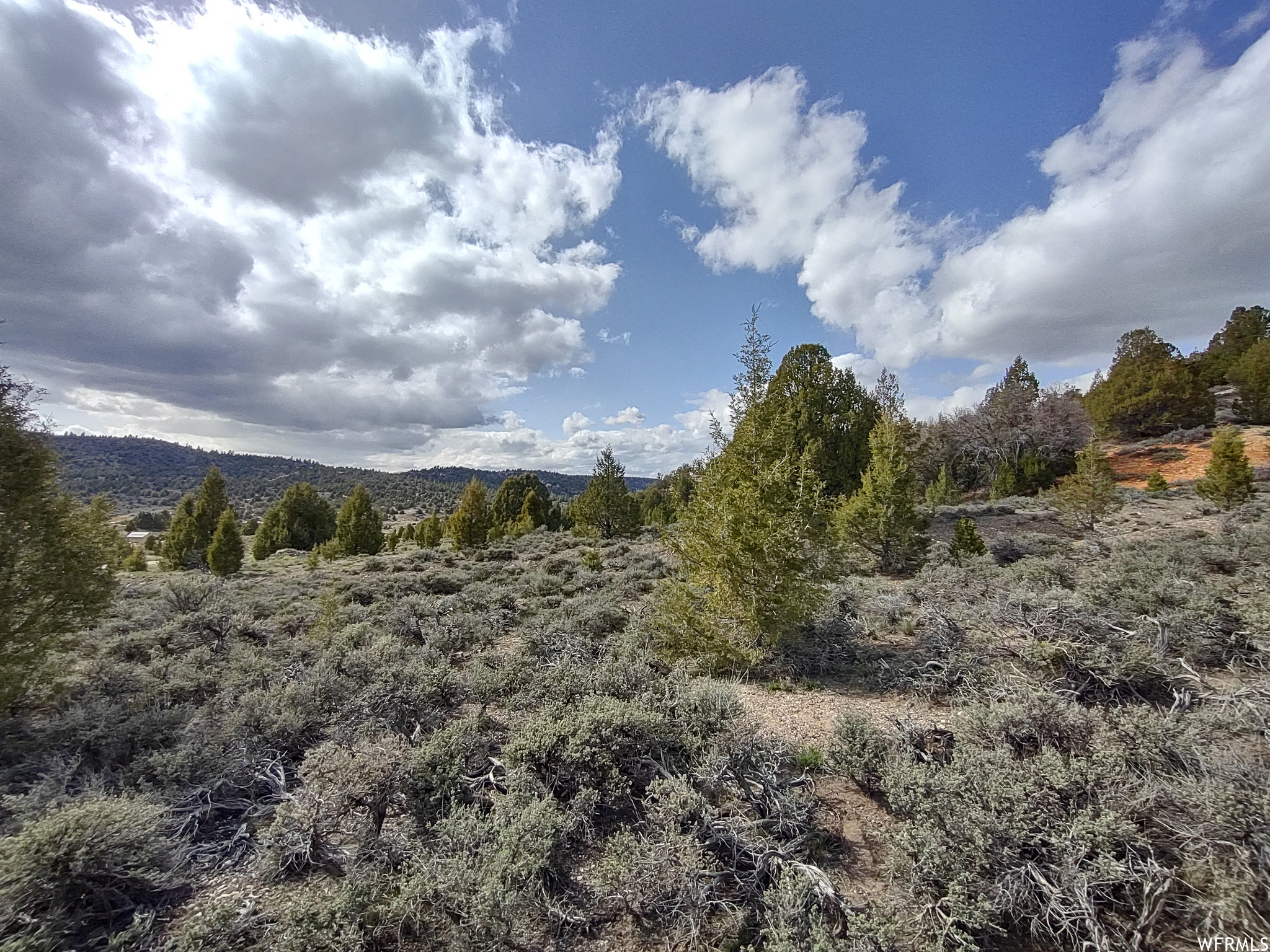 Great cabin lot or rental property in the popular Long Valley Estates subdivision! This area will almost certainly increase in value once the new Zions National Park East Entrance Visitors Center opens in 2027. Water meter is already located at the lot, and electricity in the nearby road. Three miles North of Todd's Junction on Hwy 89. Centrally located between Zions National Park, Bryce Canyon National Park, Coral Sand Dunes and Lake Powell. Enjoy the peace and quiet of nature, while still having access to the nearby highway and convenience store. Buyer responsible to verify property boundaries. Square footage figures are provided as a courtesy estimate only and were obtained from tax documents. Buyer is advised to obtain an independent measurement.