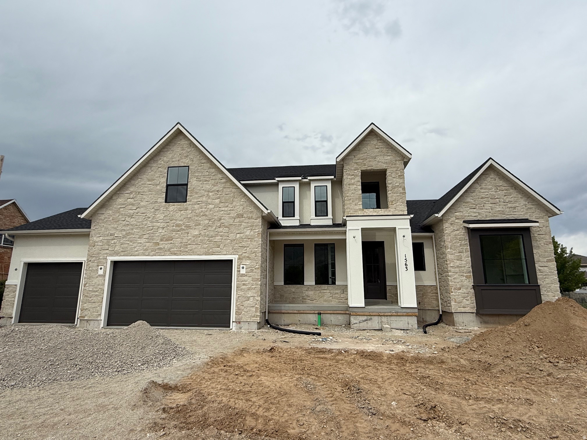 Check out our Julia floor plan in our Makin Dreams community! Beautifully designed two-story home featuring an open, light-filled layout with a dramatic two-story entry and great room. The main-level primary suite offers comfort and privacy, while the gourmet kitchen opens seamlessly to the living and dining spaces perfect for entertaining. Upstairs includes additional bedrooms, and a spacious loft. Thoughtful design, generous storage, and modern finishes throughout make this home ideal for today's lifestyle. Contact the sales agent for more info!