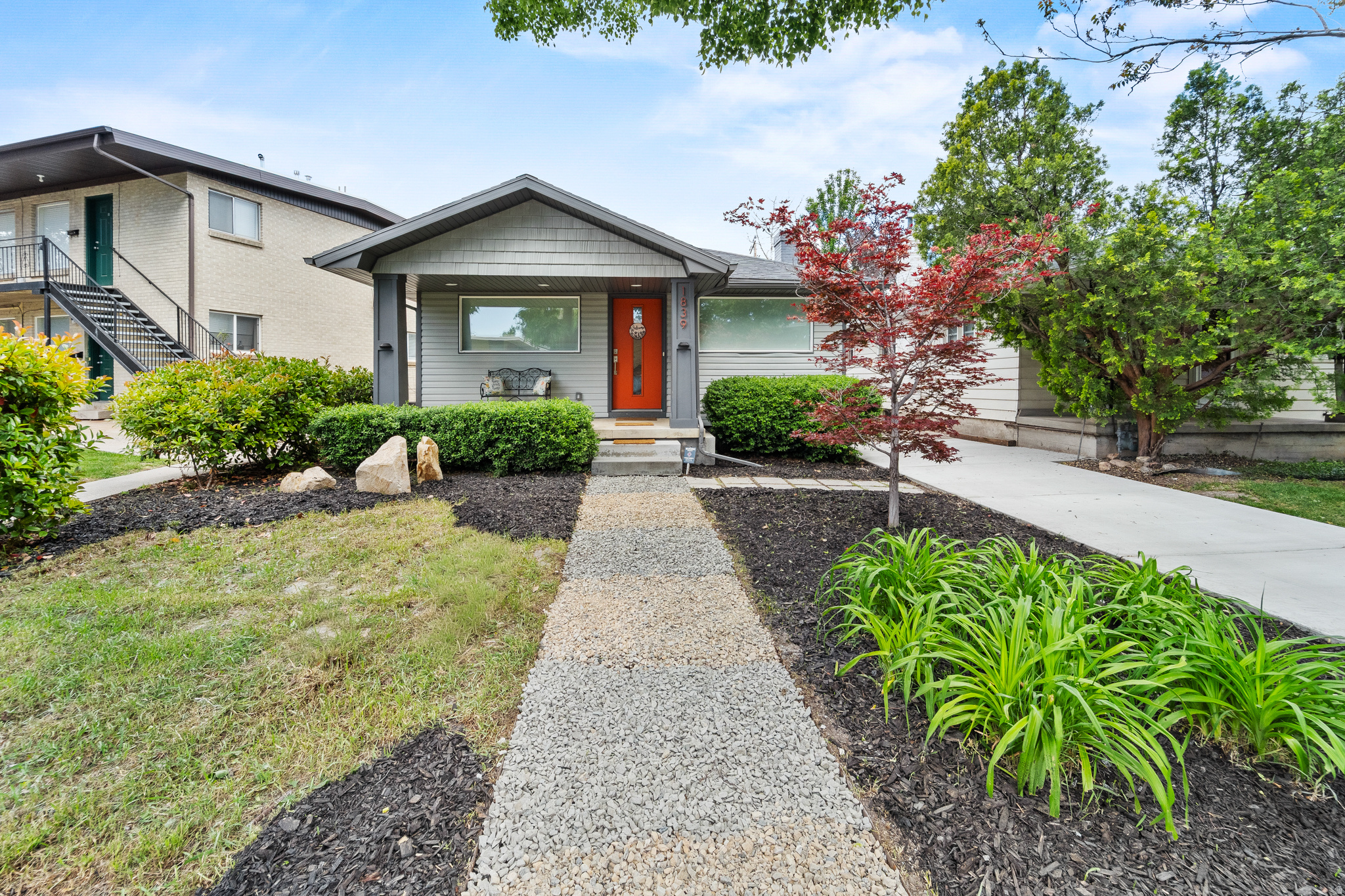 Ideally located in the heart of Sugar House, this thoughtfully remodeled and carefully maintained bungalow offers comfort, flexibility, and walkable city living just moments from Sugar House Park, Finn's Cafe, Sugar House Coffee, and the restaurants and shops along 2100 South.  Filled with natural light, the main level features an open-concept layout that flows easily between the living, dining, and kitchen spaces, creating an inviting setting for both everyday living and entertaining. The spacious primary bedroom is complemented by a versatile flex room ideal for a home office, nursery, or creative space.  The fully finished lower level expands the home's functionality with an additional bedroom, full bathroom, laundry area, and a comfortable media/lounge space with built-in surround sound, home theater feel, and integrated whole-home audio system.  Outside, enjoy a private backyard patio, detached garage with storage, and additional off-street parking.  Convenient access to downtown Salt Lake, the University of Utah, and I-80 makes getting around the valley easy while still enjoying the charm and walkability of one of Salt Lake City's most beloved neighborhoods.  A move-in ready Sugar House home with extensive updates, flexible living space, and an exceptional central location.