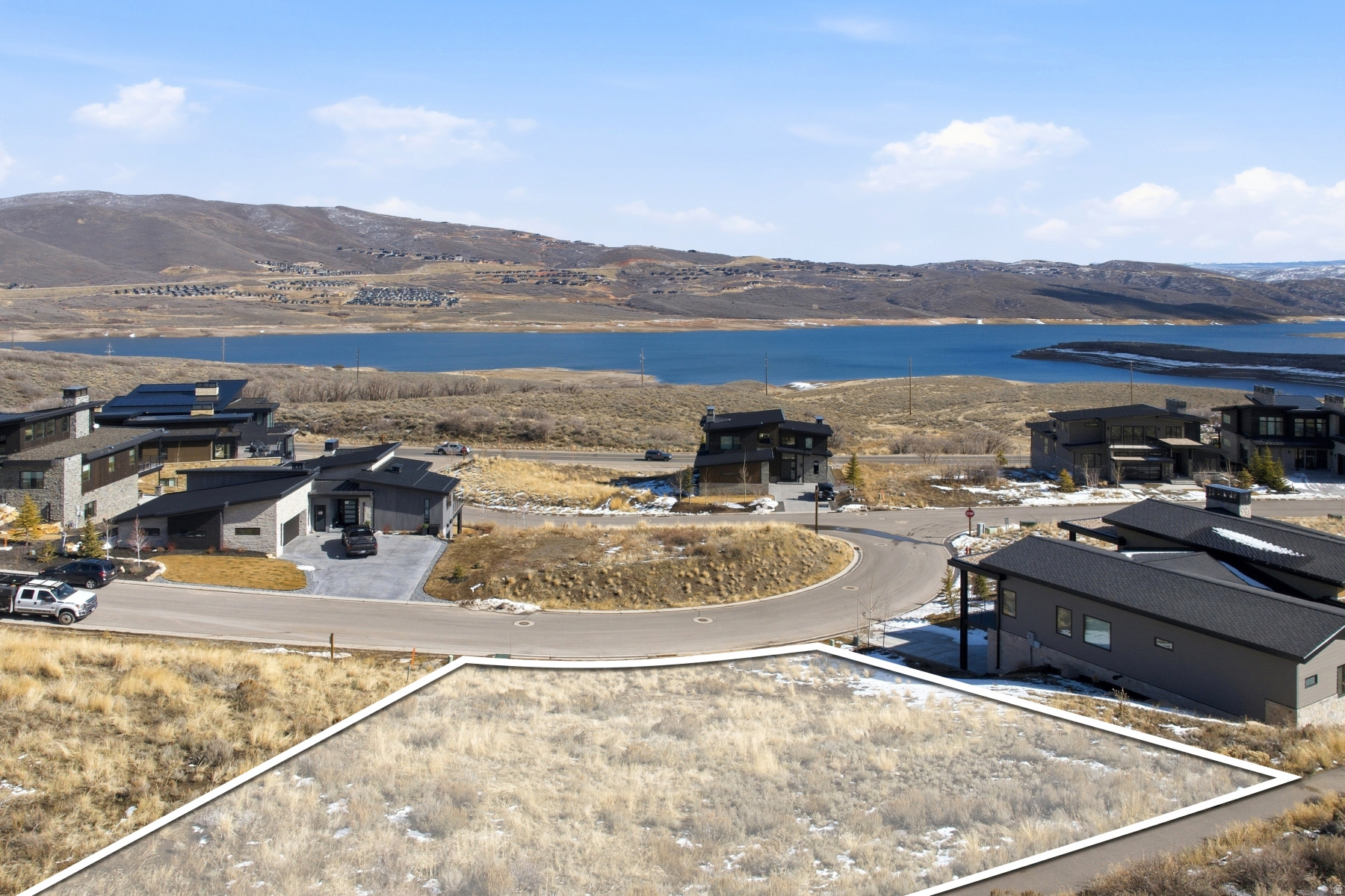 This stunning ready to build homesite in SkyRidge offers breathtaking panoramic views of the majestic ski runs at Deer Valley Resort and the tranquil waters of the Jordanelle. With a plated open space across the street and a trail and open space behind the lot, views and privacy are guaranteed. As part of the exclusive SkyRidge community, you'll have access to amenities that cater to your every need and desire. Offering a shuttle service from home to slopes, golf and a state-of-the-art clubhouse to a full-service pro shop and a gourmet market cafe & iconic bar, every detail has been thoughtfully curated. And for those who seek a balanced lifestyle that seamlessly blends adventure with relaxation, SkyRidge Mountain Community offers the perfect home base for endless Park City exploring. Whether you're hitting the slopes at Deer Valley Resort, dining at world-class restaurants, or indulging in the vibrant cultural scene, this community provides the ideal backdrop for a life well-lived.