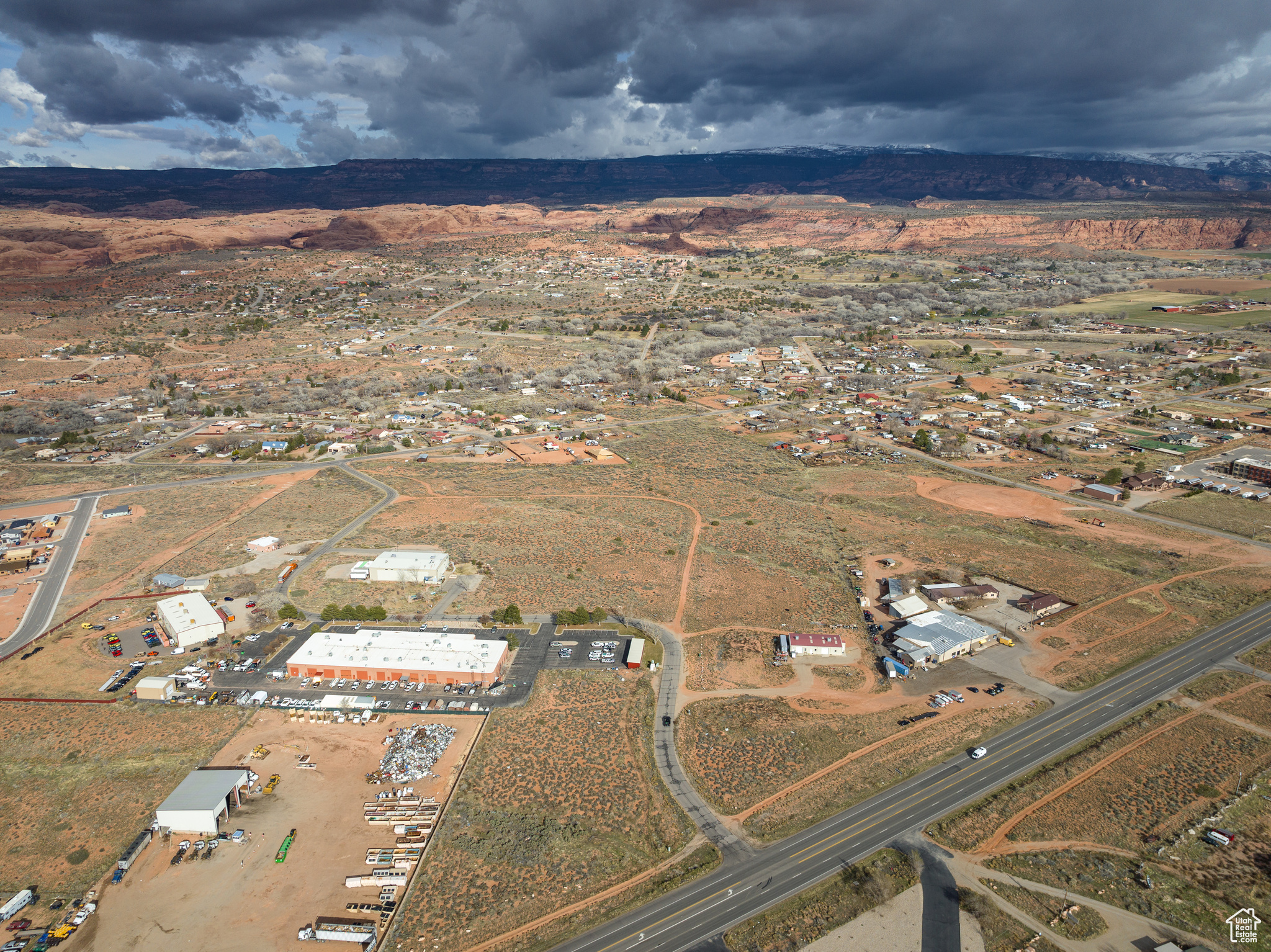 Premier Commercial Lot located in Moab's Strategic Growth Corridor. Secure your place in McKnight Commercial Subdivision-perfectly located and just minutes from downtown Moab. Zoned Highway Commercial (HC), this subdivision offers unmatched versatility for commercial use, accommodating retail, office space, services, and more. Prime Location: Positioned between HWY 191 and Spanish Valley Drive, only three miles south of downtown, providing exceptional accessibility and visibility. Limited Availability: Only 9 lots remain out of the original 17. Development-Ready: Road and critical utilities-water, sewer, power, telecom-are fully established, enabling immediate development. Take advantage of this opportunity to be part of Moab's Limited Commercial Landscape.