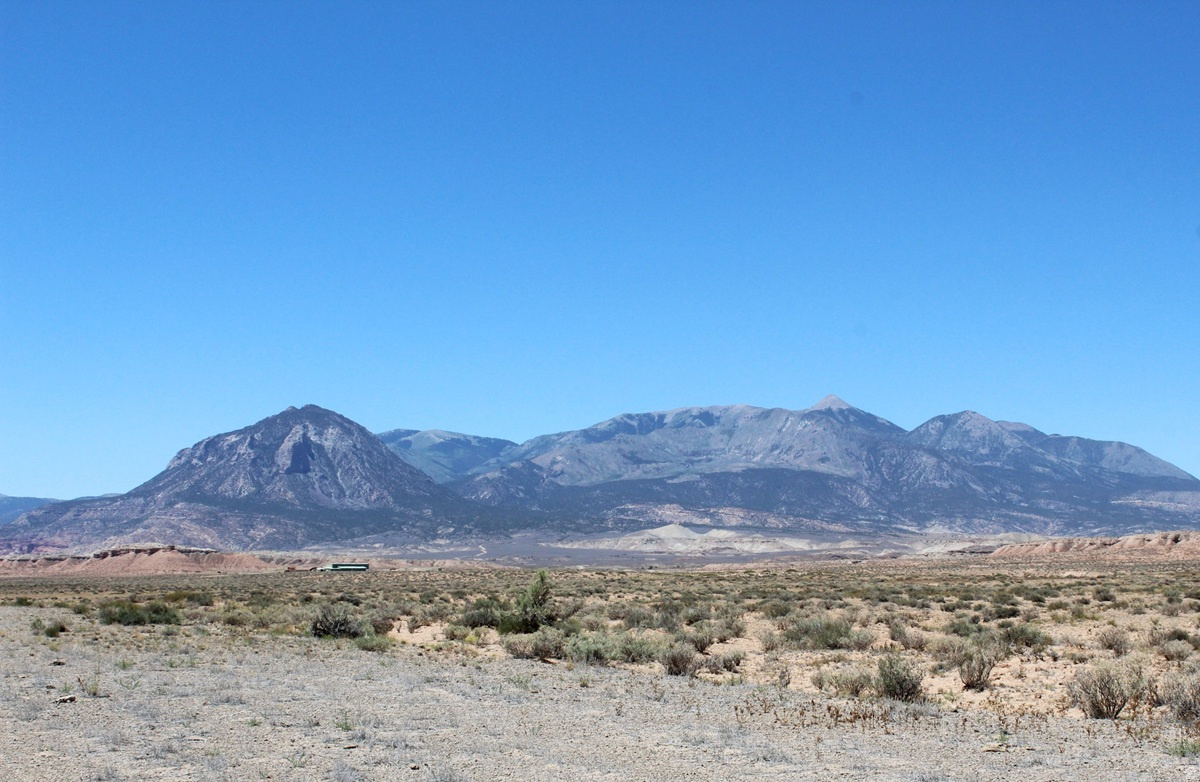 622 Acres of Commercial Development Land  10 Miles South of Hanksville, Utah Rare opportunity to acquire 622 acres of desert land 10 miles south of Hanksville. With expansive frontage, excellent access, and wide-open development possibilities, this property offers tremendous potential for commercial, industrial, energy, recreation, or investment uses. An existing well adds significant value, offering a vital resource that is increasingly difficult to secure in the area. With the property's large acreage and & location, creates a unique opportunity for developers and investors. Surrounded by Utah's red rock landscapes and located near popular recreation destinations, the property benefits from both industrial development potential and growing tourism activity in the area. The level terrain and wide-open space offer flexibility for a variety of future uses. Whether you're seeking a long-term land investment or a development site, this 622-acre parcel presents an exceptional opportunity. Located 10 miles south of Hanksville. Access from Highway 95 and Fairview Ranch Road.
