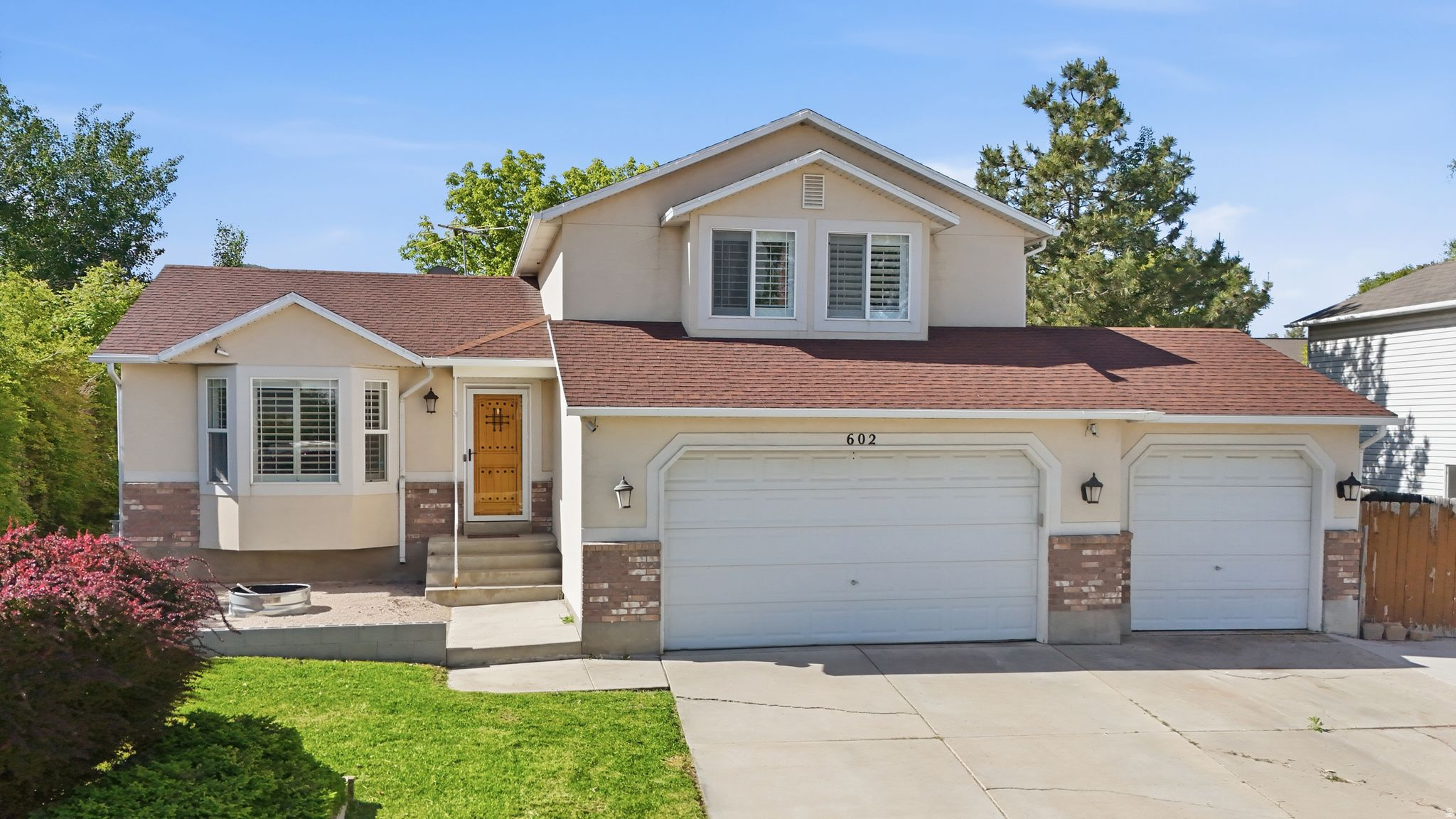 This beautiful home will not last long! Spacious home with vaulted ceilings, updated kitchen with custom cabinets, granite countertops and stainless steel appliances. Open floorplan is perfect for entertaining the whole family. Lots of storage with a huge 3 car garage, shed and RV parking for all your toys! Backs to a quiet church. Master has large walk in closet, jetted tub with separate shower and its own private deck with views. Plantation shutters throughout home. Water heater and furnace replaced in the last 3 years. This one will impress!
