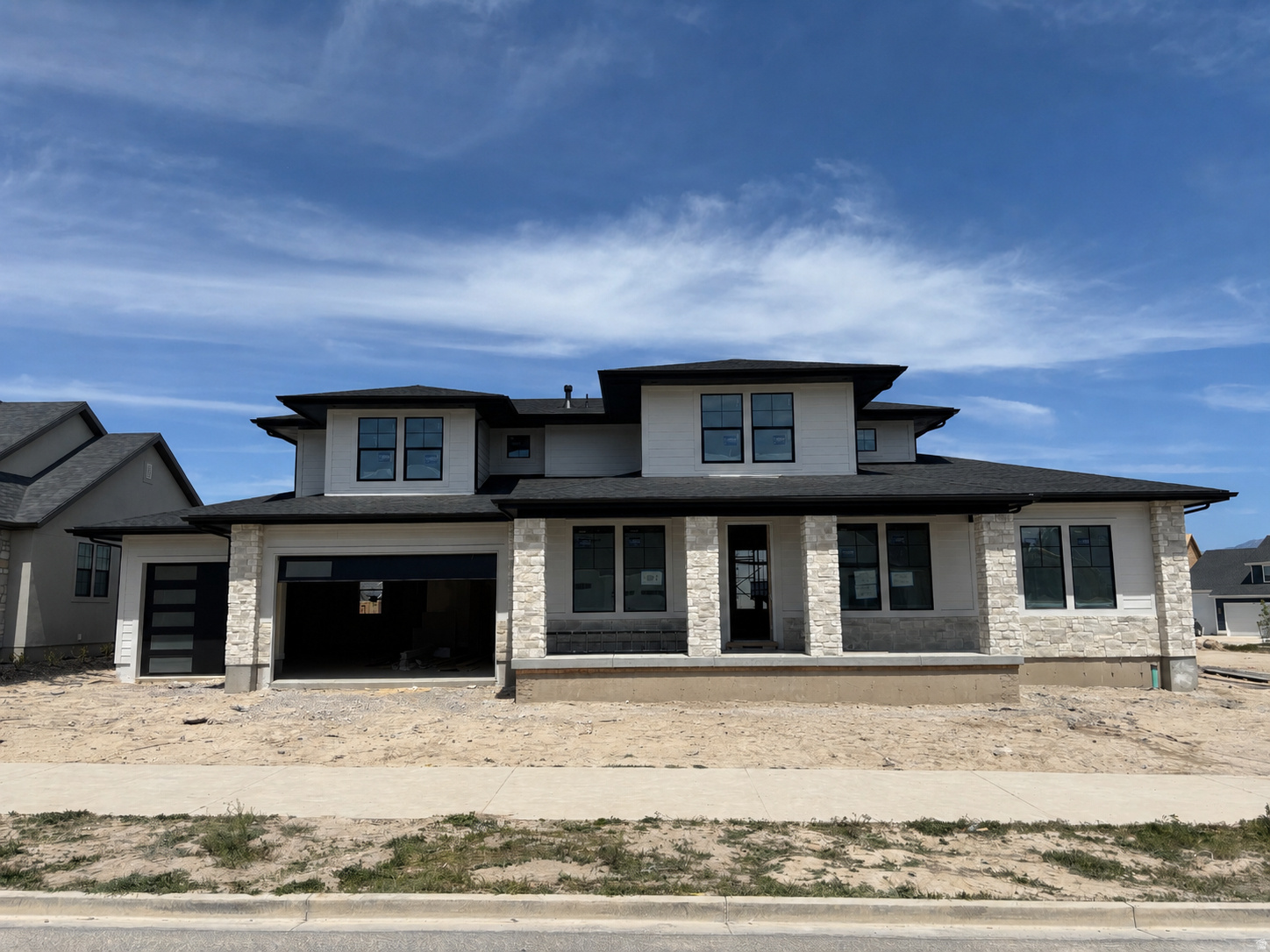 LOT#166 in Beacon Pointe by Symphony Homes. This stunning 'Browning XL' plan blends luxury with thoughtful design. Home is under construction and will be completed in July. Price includes full yard landscaping. Lots of upgrades and designer finishes throughout! The main floor features both a flex room (w/ French doors) and a formal living room with custom millwork and both have crown molding. Grand great room with two-story ceiling with wood beam grid ceiling. The gourmet kitchen will have quality appliances including a 48" ZLine 8-burner dual fuel range with double ovens, and a built-in refrigerator and freezer, a spacious butler's pantry, and a bright dining nook that opens to the covered patio. A custom mudroom bench and a large laundry room add everyday convenience. The expansive primary suite will have a decorative ceiling and includes a large custom-finished wardrobe room with a window. Primary bathroom will be a show-stopper with separated vanities plus a makeup counter, free-standing soaker tub, and 78x60 walk-in shower with a quartz bench. Upstairs has a loft open to below and a large bonus room. All bedrooms feature walk-in closets. The fully finished basement is built for entertaining with a media room, kitchenette, huge game room, and a gym with 3/4 bathroom (also accessed by adjacent bedroom). Garage will be finished to paint and 3rd stall is 38' deep and 18' wide in the back for potential to park capacity of 4 vehicles.  9' foundation walls, an active radon system, and a cold cellar. A must-see!