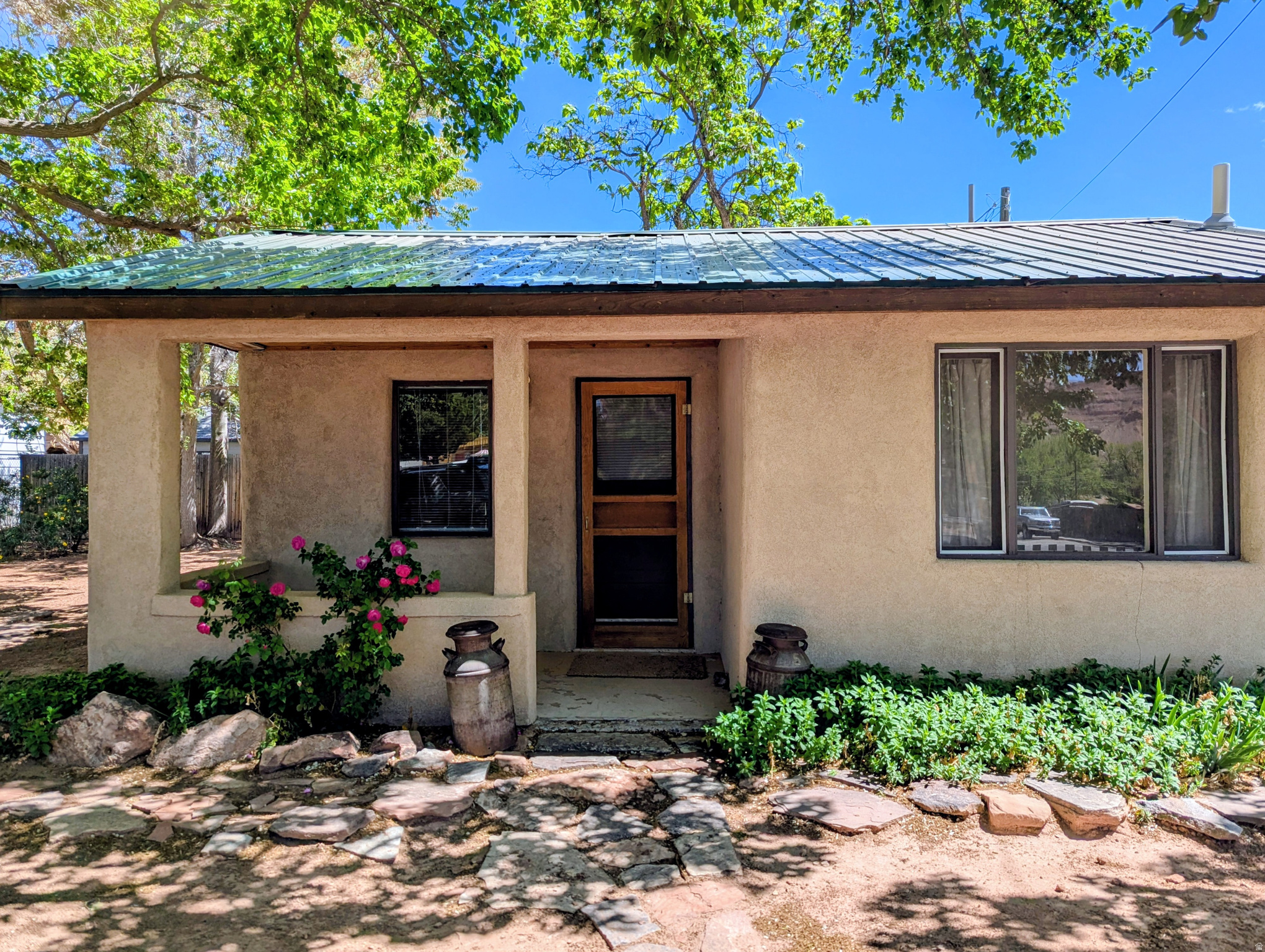 Looking for a Getaway to Moab, UT? We just listed a jewel of a property. This cute completely furnished Cottage Bungalow is in town and has plenty of possibilities. Walk to town, restaurants, and stores. Go biking and hiking out your back door. Also, if you are looking for a business location, this will work for a neighborhood zone C5. It has been updated with newer metal roof and stucco exterior. Property is being sold "as-is condition".