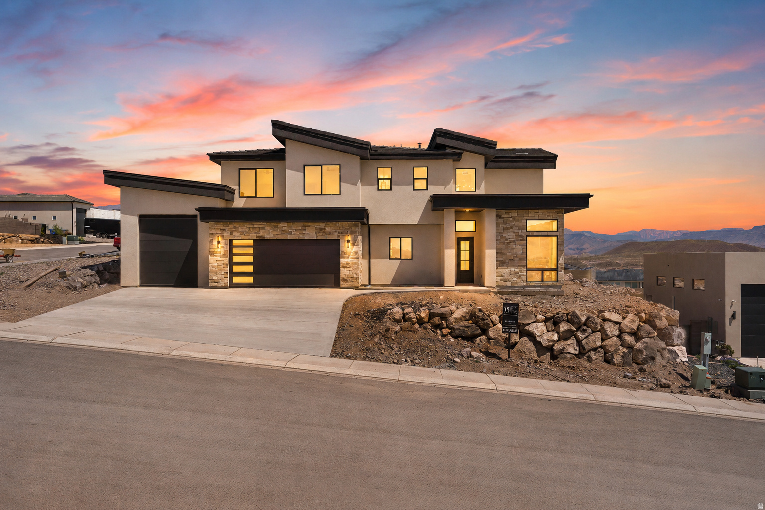 Experience elevated desert living with unobstructed views of Zion National Park. Designed specifically for the lot, every space captures light, privacy, and the surrounding landscape in a way that feels intentional from the moment you arrive. Inside, soaring ceilings and expansive windows create a bright, open feel, anchored by a spacious kitchen made for gathering and entertaining. A butler's pantry keeps everything tucked away, allowing the main living areas to stay clean, refined, and ready to host. The main-level master suite offers a private retreat, separate from the rest of the home. Step outside and the lifestyle takes over. Long days by the pool, evenings under the covered patio, and effortless indoor-outdoor living with an outdoor shower and dedicated pool bath. It's built for both relaxation and entertaining. For those who live the Southern Utah lifestyle, the oversized RV garage provides space for all your toys-whether it's side-by-sides, boats, or gear for the surrounding desert and mountains. With five bedrooms and thoughtfully designed spaces throughout, this home offers the perfect balance of luxury, function, and adventure-just minutes from world-class recreation.The pool and landscaping will be finished in a few weeks.  Square footage figures are provided as a courtesy estimate only and were obtained from Building Plans. Buyer is advised to obtain an independent measurement.