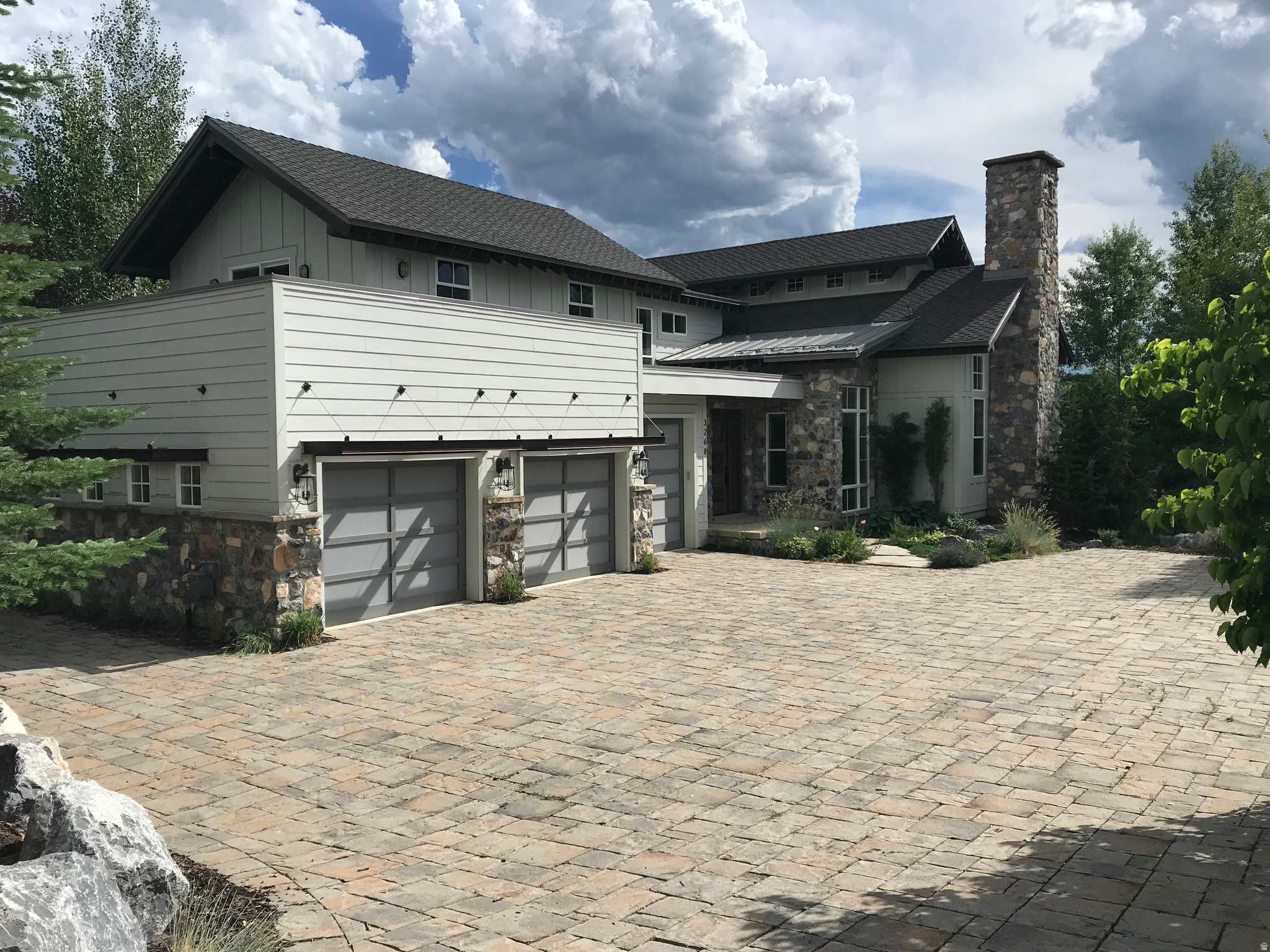 Come see this unique contemporary newly renovated custom home designed by Park City architect Jean Yves Lacroix.  Featuring a clerestory in the main living area, rooftop gardens with dining and firepit area, private office/studio accessed via the rooftop gardens, and amazing timp views from everywhere in the home.   The outside of the home features multiple view patios, a custom water feature, and lake creek common area corridor backing the property.  You must see this home for yourself!  Owner/agent