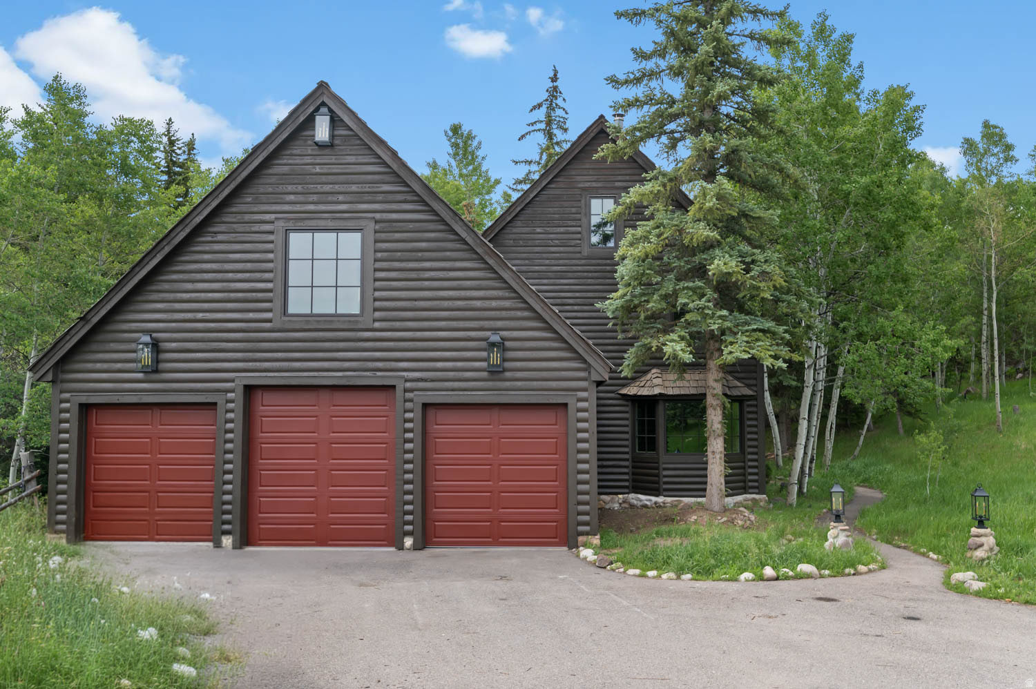 Creekside Mountain Living, Minutes from Everything          Tucked against hundreds of acres of protected open space in coveted Pinebrook, this 3,605 sq ft log home offers something nearly impossible to find: true privacy. With a creek running directly behind the house and a canyon trail right out the back door, when you step off your deck and onto the miles of HOA-exclusive hiking and biking trails, you will be met with no crowds, no trailhead parking, just your own gateway into the mountains.           Inside the home, a stunning river stone fireplace anchors the main living space - custom built by a stone artisan and truly one of a kind. Engineered hardwood, wool carpet, and tile run throughout the entire freshly painted interior. The oversized master suite is a genuine retreat, featuring a large walk-in closet and a beautiful, spacious en-suite bath. The finished attic offers flexible space which can easily be used as an additional bedroom or two. Downstairs, not only is the walkout-level basement warmed by a gas fireplace and built for entertaining, it's already plumbed for a future bathroom. A sauna just outside the lower level completes the mountain experience.          Outdoor living is where this home shines. Expansive deck space with a hot tub overlooks a deeply private backyard kept lush by a full sprinkler system, all backing up to dedicated open space. Host a crowd or enjoy total solitude - this property does both effortlessly.          The details are handled: brand new windows, new exterior doors, new garage doors, and a complete exterior repaint in Sherwin-Williams' highest-grade Emerald paint. The oversized garage is tall enough for full-size pickups. Natural gas service (no propane), and the community's water comes from a pristine artesian spring. This home is move-in ready, as-is. Pinebrook HOA amenities include two private parks, two pickleball courts, two tennis courts, playgrounds, and an exclusive trail network. All of it just minutes from Park City's outlets, grocery, Ace Hardware, and restaurants - yet it feels a world away.