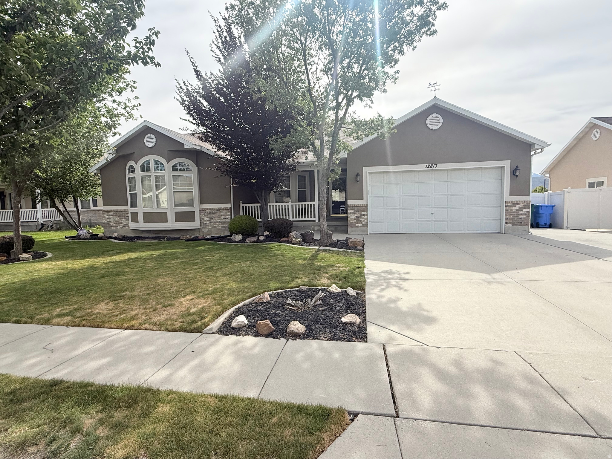 You will be so impressed with this amazing home. So many upgrades and updates.  This beautiful kitchen with vaulted ceilings, stainless appliances,  stone backsplash, custom cabinets with soft close, large island with storage underneath, granite counter-tops. This kitchen and great room are perfect for entertaining. The family room is complete wih  floor to ceiling tile surrounding the fireplace.  The main level has 4 bedrooms including the master bedroom, with en suite bathroom including soaking tub, separate tile shower and huge walk in closet. The basement offers so much possibility with the second full kitchen, custom cabinets and tiled floors.  The basement has  a mother in law apartment and 2 more bedrooms. This home has so much storage including a big storage room, and tons of closet space.  The west facing home has a large yard, with afternoon shade.  The fully fenced yard has a covered patio perfect for barbecuing.  The backyard has a great view of the Wasatch Mountains! There is also room for an RV. This home has been well loved by the original owner. They have taken care and loved this home. They have upgraded many items,  but here are some the most recent: New Deck 2025 Roof installed 2022 New Furnace and AC- 2024 Kitchen remodel in 2021 This beautiful home is a must see.