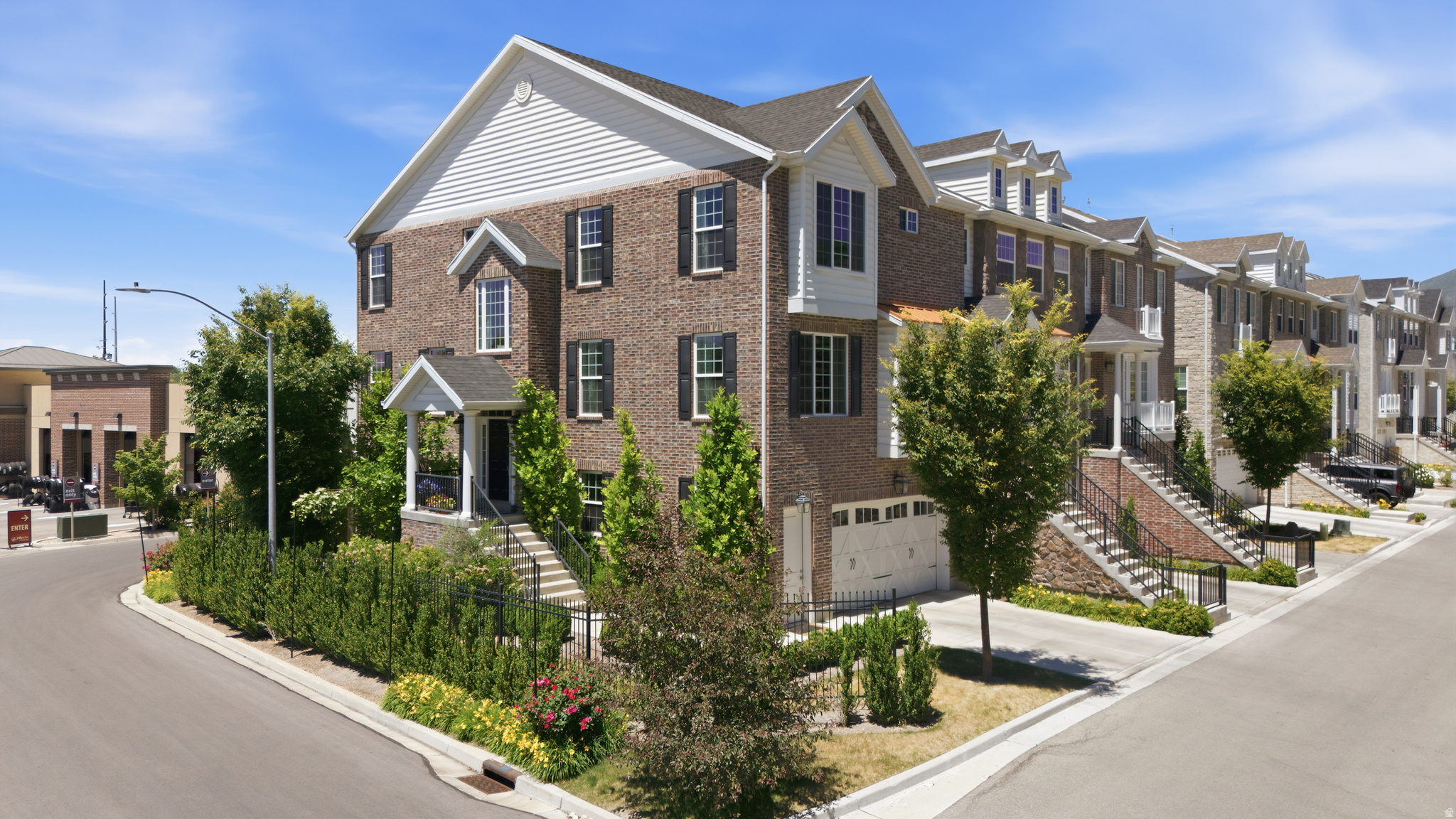 Beautifully maintained end-unit townhome located in the highly desirable Olde Ivy subdivision in Provo. Originally built as the builder's model home, this upgraded residence offers exceptional design, quality finishes, and a thoughtfully designed floor plan that takes full advantage of its desirable three-sided exposure, abundant natural light, and beautiful mountain and sunset views. The home features spacious living areas with 9-foot ceilings, multiple gathering spaces, and a layout designed for both everyday living and entertaining. The large primary suite offers a spacious bedroom, luxurious bathroom, and oversized walk-in closet. All bedrooms feature large walk-in closets, providing exceptional storage throughout the home. The main floor includes a dedicated craft room, sitting room with fireplace, and a spacious great room. The beautifully appointed kitchen is equipped with Cafe appliances, a large walk-in pantry, and opens seamlessly to the surrounding living spaces. The fully finished basement provides additional living and entertaining space, mudroom off the garage entry, while the ample unfinished basement area offers incredible storage and future flexibility. Additional upgrades include a water softener installed in 2026, dual central air conditioning and HVAC systems, and exterior landscaping maintained by the HOA for low-maintenance living. Perfectly positioned within the community, this end unit enjoys mountain views, spectacular sunsets, and easy access to nearby amenities. Located just minutes from BYU, Provo Canyon, shopping, dining, parks, trails, and recreation, this home offers the ideal combination of convenience and lifestyle. Enjoy quick access to hiking, biking, skiing, the Provo River Parkway Trail, and everything Utah Valley has to offer. This is a rare opportunity to own one of the premier homes in Olde Ivy, combining upgraded finishes, exceptional storage, stunning views, and an unbeatable Provo location. Square footage figures are provided as a courtesy estimate only and were obtained from county records.  Buyer is advised to obtain an independent measurement.