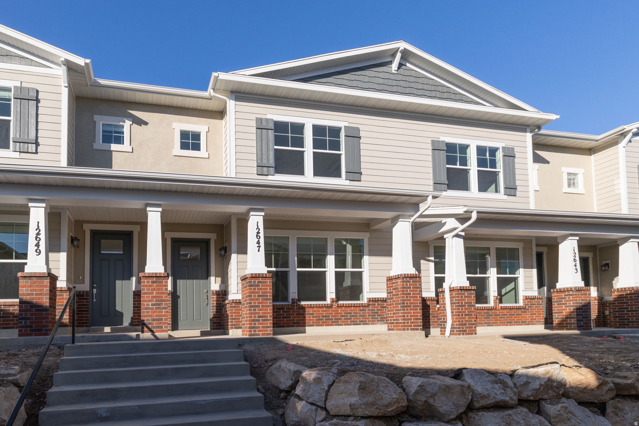 Nestled in the vibrant community of Herriman, Utah, this two-story townhome offers 3 bedrooms, 2.5 bathrooms, and a stylish, comfortable layout perfect for modern living. The main level features an open-concept design, where the living room flows effortlessly into the dining area and kitchen. The thoughtful layout makes the space ideal for both entertaining and everyday living. Upstairs, you'll find three bedrooms, including a loft area that provides the perfect spot for a home office, playroom, or additional lounge space. A conveniently located laundry room on the second floor adds to the home's practicality. This townhome features a two-car attached garage and is situated in a vibrant neighborhood near excellent schools, shopping, dining, and outdoor recreation. Offering a blend of modern living and everyday convenience, this Herriman home is ready to welcome you. Schedule a tour today to see it for yourself! Square footage figures are provided as a courtesy estimate only and were obtained from building plans. Buyer is advised to obtain an independent measurement.
