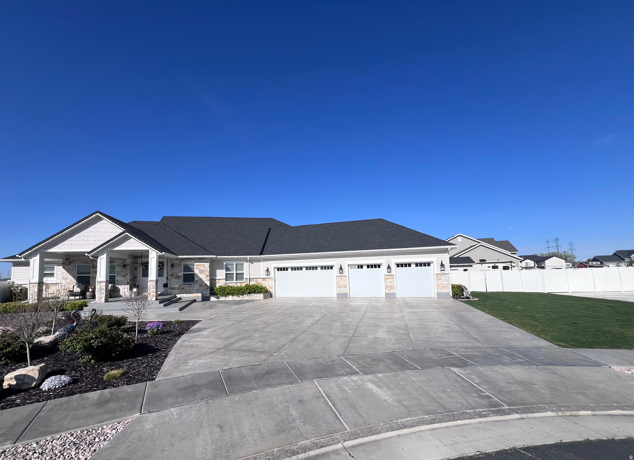 This Home is a Unicorn!!  Unique in every way!  You won't find another like it!  The home was custom drawn and designed by Wes StoneHocker of Ridgelne Architects.   The owners love this home and you will too!!   Have you been wanting to build your own patio home but just don't feel you have the time ?  If you are looking for a One Level Patio Dream Home and not having much luck, well look no further!  Walk into this Magnificent Showcase home and take it All IN!  From the Custom chef kitchen complete with a spacious island bar with custom sink , together with a stainless steel gas range and custom hood and another chef sink that's perfect for dinner prep and other kitchen needs.  Vaulted ceilings and custom built in shelving adorn the home and make it feel Open and spacious and very inviting!  The custom 3/4 inch Hickory floor is sure to please the eye as well as all the custom finishes and built-ins throughout the home.  There are 2 family rooms, and 2 fireplaces that are perfect for relaxing and gathering.  The home features custom paint throughout together with hardwares and other finishes that are sure to please.  All 4 of the bedrooms have their very own bathrooms that are professionally done with tile and beautiful finishes.  Now let's talk about the Spectacular Primary Bathroom and suite!  This bathroom is incredibly functional, complete with its very own custom walk in shower with custom glass and finishes.  The tub is a garden tub self standing and the vanity is a beautiful custom double vanity with granite counter.  The entire Bathroom is custom built and finished with upgrades Galore!  You will Just want to escape in this elegant Space!   The primary bedroom also features a spacious walk in closet with organizers and shelving .  This Custom Beauty of a Patio Home Features Just about everything you can think of, and it includes the Swim spa (Like New) and the Sauna.  The owners are even willing to sell all the furniture with a separate bill of sale.  The Custom Home exterior features include, a Large custom covered front entry porch with enamel coating.  the drive way has been sealed every year by the owner to prevent damage and cracks.  The roof is top of the line asphalt shingles(Woodcrest)  made by Owens Corning.  The Exterior of the home is Gorgeous Natural stone and custom siding.  The windows are double paned with a low E tint to soften the exposure from the sunlight.  The garage is a 4 car garage and the North side of the home could easily become a very large RV parking area for the home.  The back yard is truly amazing with plenty of room to play, relax, and just enjoy Life!!  the Back yard is custom fenced fully with concrete under the fencing to stop the weeds from growing and to keep this gorgeous yard Pristine.  The custom 25x25 deck is a wonderful place to relax and gather and it is also covered to prevent exposure from the elements. The back yard also has fruit trees and a custom built storage shed with its own garage door.  The shed is approximately 16x14.   After a long hard day or just on a Beautiful morning one can escape to their very own private swim spa made by Cal Spas and do some relaxing or swimming whichever you wish.  Then you can step into the sauna and dry off and soothe your muscles and body while you relax even further.  Located in Quiet Plain City Utah this home sits on a .57 acre cut-de-sac lot which has Fantastic Views of the Willard Peak Mountains to the East.  You Need to see this Home!! You Really Do!!  Showings by appointment only!!  contact the listing agent for further details.  Open House Sat May 2nd 12-2 pm.