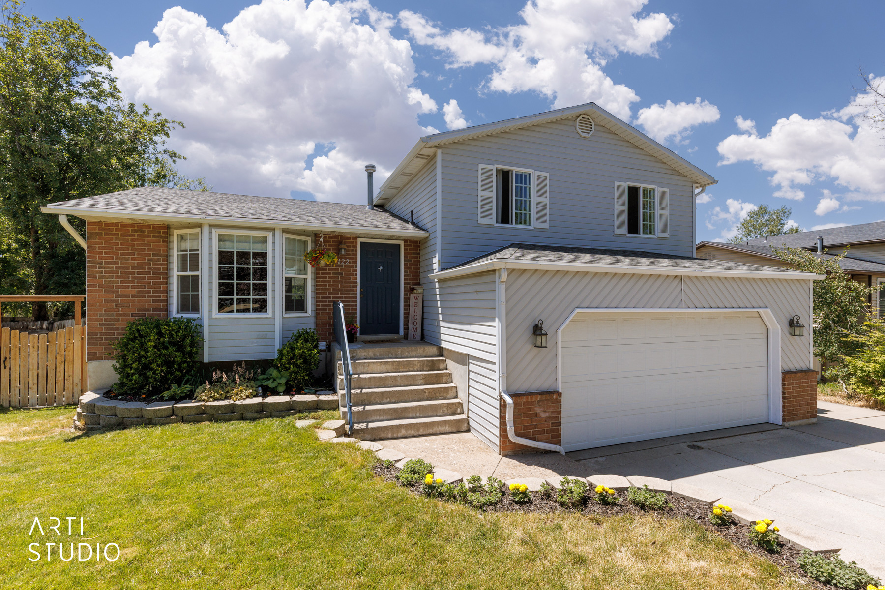 Enjoy a spacious fully fenced backyard with a large deck at this Layton home featuring granite countertops and abundant storage. Flexible downstairs room could serve as a fifth bedroom, office, or hobby space. Huge crawl space with shelving and fiber optic internet add to the home's appeal.