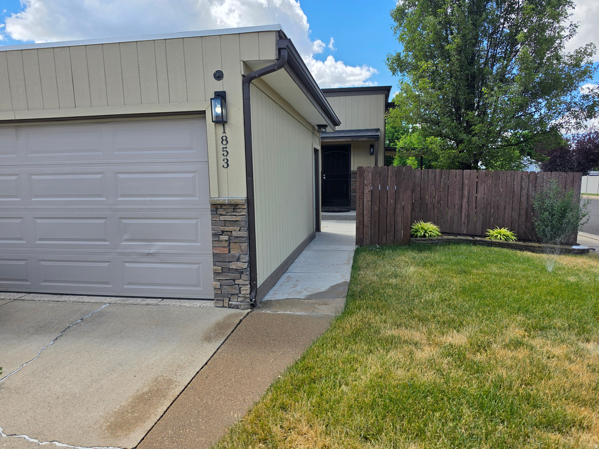 Stunning Updated Twin Home in South Ogden, Quiet neighborhood, close to Weber State University and Ogden Regional Hospital. NO HOA! Offers 4 bedrooms, 2 bathrooms and a 2-car garage. This is the nicest, truly move-in ready home in the area at this price point. Updated inside and out, this home offers space and privacy you want. Incredible curb appeal with its updated stone, paint, windows, fence, lush landscaping, and newer roof. Inside you'll find new LPV flooring, carpet, paint, can lighting, light fixtures, and updated bathroom. Truly a must-see! Schedule your tour today before it's gone.