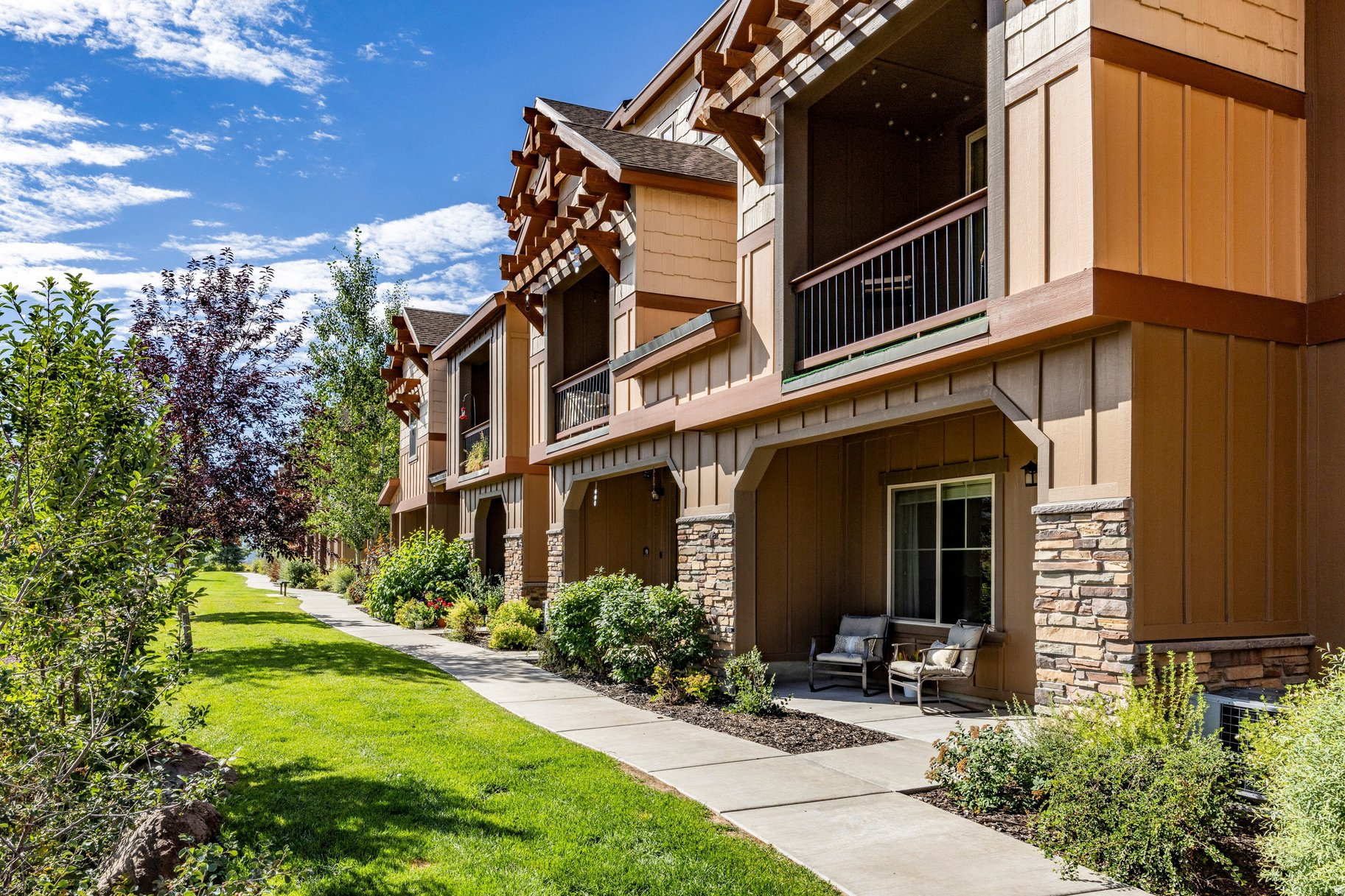 This Park's Edge townhome checks every box - whether you're looking for a primary residence, a mountain getaway, or a savvy investment. With bedrooms and bathrooms on all three floors, the layout offers flexible living and natural privacy for owners and guests alike. Enjoy the outdoors from a generous front porch or private balcony, and come home to thoughtful extras like a built-in bar area off the kitchen, a den workspace with views near the primary suite, and an oversized garage closet purpose-built for bikes, skis, and all your adventure gear. A whole-home water purification system, water softener, and air cleaner round out a property that's truly turnkey. Park's Edge owners enjoy access to community amenities - with the added bonus of nightly rental eligibility.