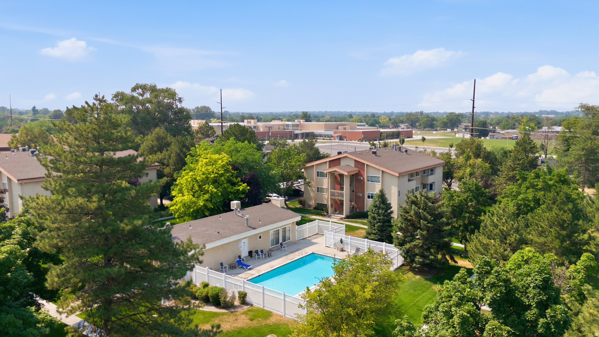 One of the FEW 3 bed units available in this complex!  Country Wood units offer an open, functional floor plan with large kitchens, 2 FULL baths, and in-unit  laundry.  Centrally located with well maintained, peaceful grounds.  Pool, clubhouse, one covered parking unit.  Buyer to verify all HOA documentation.