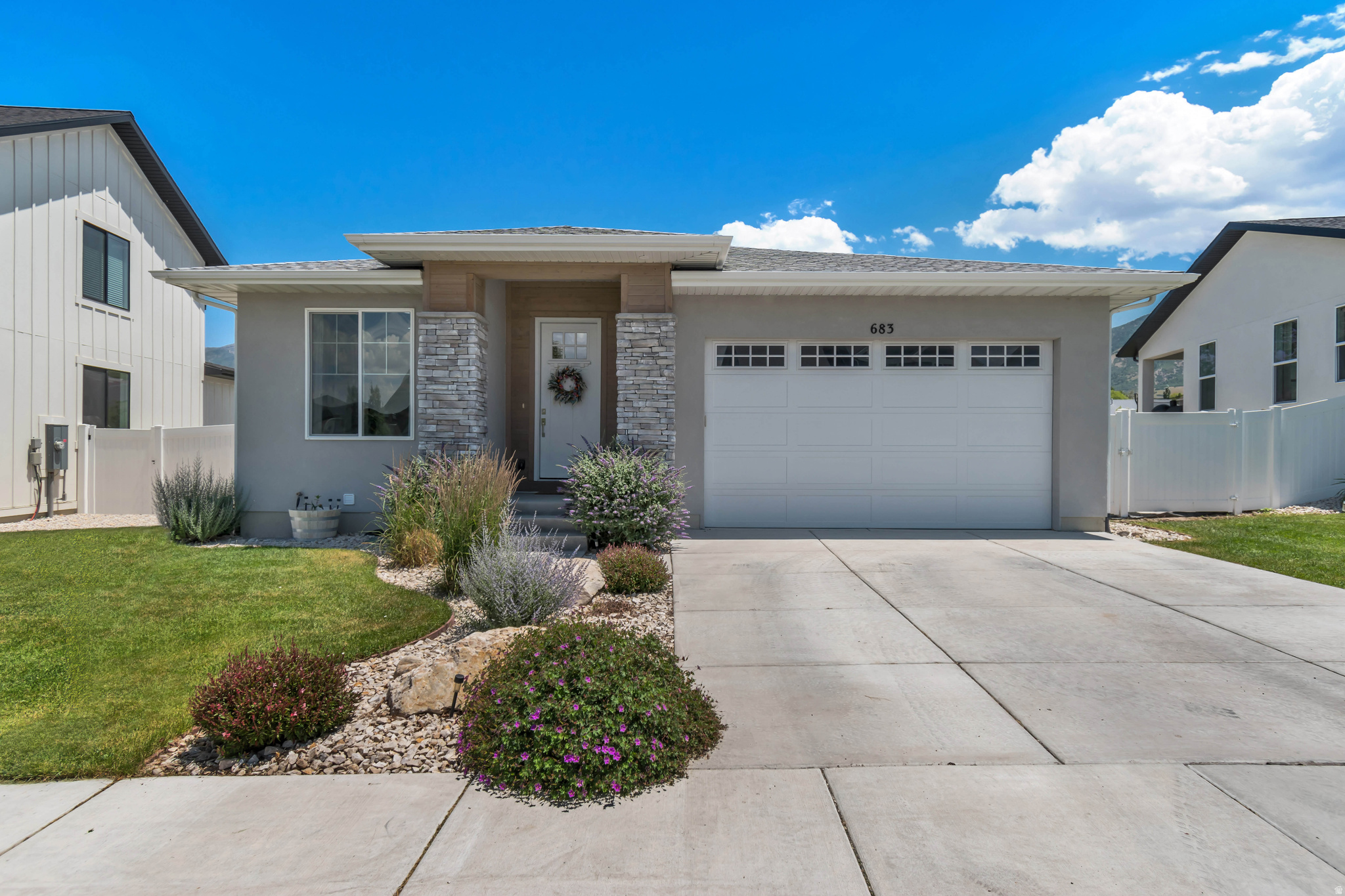 Come see this stunning rambler that offers a wide-open floor plan, vaulted ceilings, oversized walk-up window wells for natural light, 8' tall doors, and so much more! RV parking available on the side of the home, with an attached 2 car garage that features two 220v outlets. Master bedroom and laundry on the main floor, with an additional "master" bedroom downstairs. Enjoy the beautiful landscaping, and the fenced backyard that features a drip system for gardening!  Square footage figures are provided as a courtesy estimate only and were obtained from county records .  Buyer is advised to obtain an independent measurement.