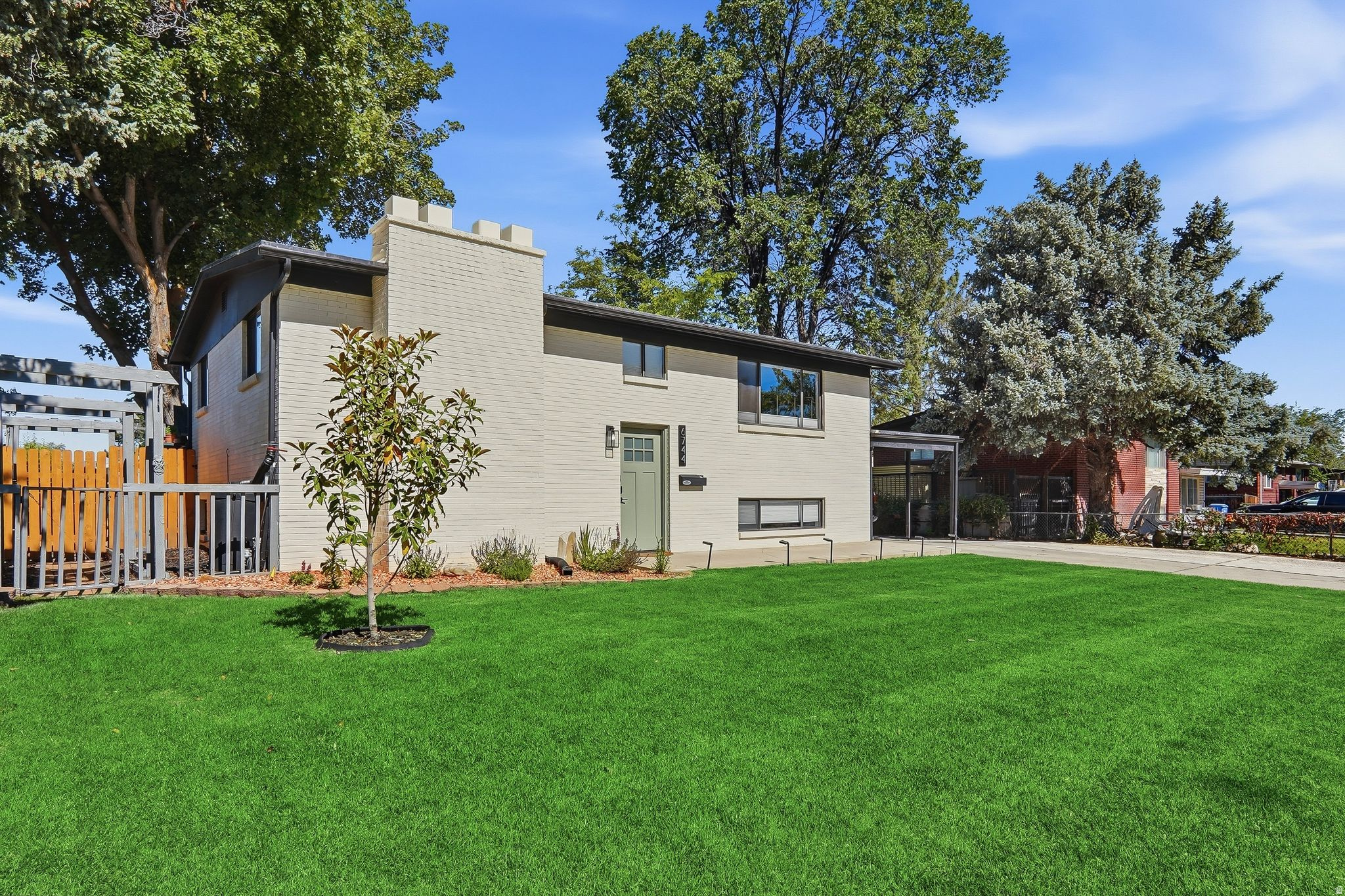 Beautifully updated home in the heart of Cottonwood Heights! Centrally located and designed for both comfortable living and entertaining, this 4-bedroom, 2-bathroom home showcases stylish upgrades throughout. The remodeled kitchen features quartz countertops, quality cabinetry, and elegant finishes. Enjoy new flooring, custom window shades, and thoughtfully updated living spaces. Recent improvements include a new HVAC system and water heater, providing peace of mind for years to come. Outside, the refinished deck is perfect for gatherings, while the upgraded sprinkler system helps maintain the yard with ease. Complete with a two-car garage, additional carport parking, and an unbeatable location.