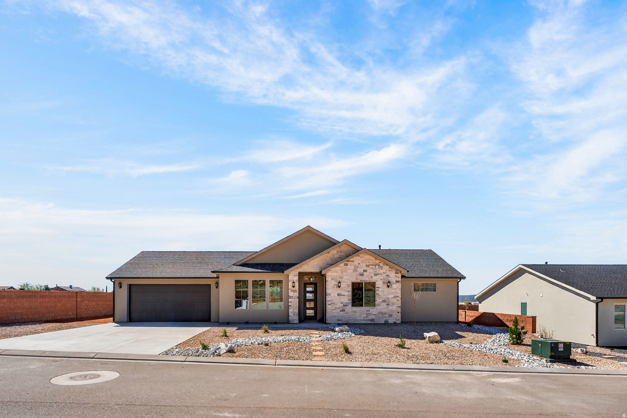**Seller financing is an option with 20% down**Introducing a stunning new home in the prestigious Heights Subdivision! This thoughtfully designed 3-bedroom, 2-bathroom home offers breathtaking red rock mountain views, a spacious 2-car garage, and RV parking for all your toys. The gourmet kitchen will include custom white cabinetry, quartz countertops, oven range, and dishwasher, perfect for cooking, baking, and entertaining. Upgraded lighting fixtures highlight the abundant natural light, while durable LVP flooring flows through the main living areas and cozy carpet creates comfort in the bedrooms. The vaulted primary suite is a true retreat, with windows framing gorgeous views and a luxurious ensuite featuring dual vanities, a designer shower, and a relaxing soaker tub. Outside, the partially landscaped yard with fencing provides a private oasis for family, pets, and gatherings. Nestled at a 5,000 ft elevation, this home is surrounded by stunning terrain and a favorable climate. Located just off the edge of town, you'll be close to riding and hiking trails, 5 National Parks, Sand Dunes, and within a short drive to Lake Powell (90 minutes), the Grand Canyon (60 minutes), Zion (45 minutes), Kanab (30 minutes), and St. George (40 minutes). Make this extraordinary home yours today.