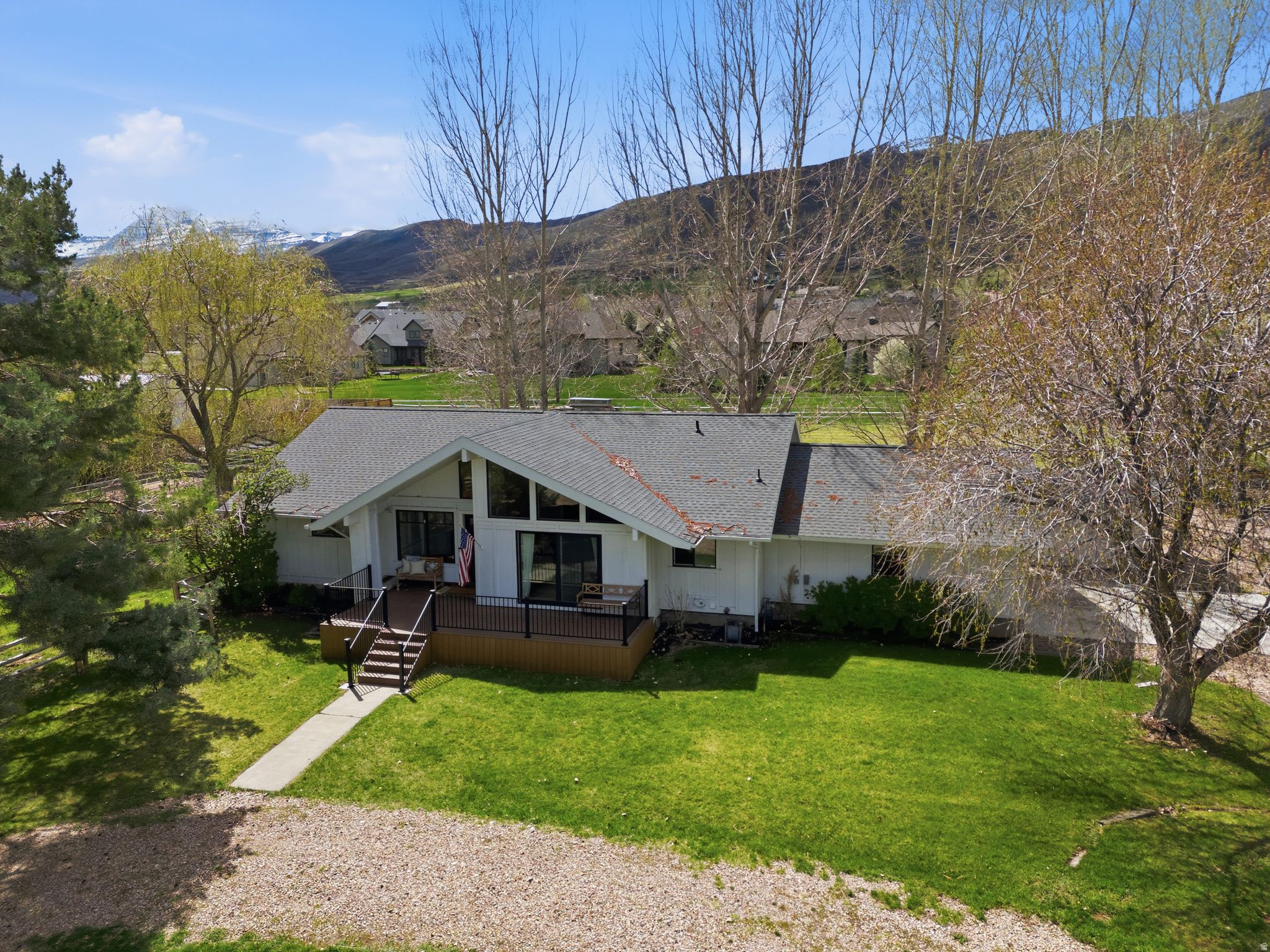 Expansive 1-Acre Midway Estate | Mountain Views & Equestrian Ready  Situated on a level 1.05-acre parcel in the heart of Midway, this 3,148-square-foot residence balances spacious interior living with significant outdoor utility. The fully fenced grounds are optimized for equestrian use, hobby farming, or curated gardening, complemented by mature apple trees and a fully fenced perimeter.  The 4-bedroom, 3-bathroom home features a light-filled, open-concept main level and a fully finished basement, offering versatility. Significant capital improvements provide long-term peace of mind, including a new roof with an integrated heat cable system (2024), HVAC (2019), and updated windows (2018). Major utility lines (sewer and water) were replaced between 20152016, ensuring a turn-key infrastructure.  Equestrian Ready: 1.05 level acres, fully fenced and usable. Storage: Ample RV parking with year-round access and functional outbuildings. Views: Unobstructed mountain vistas defining the Wasatch Back lifestyle.  Recreation: 2 miles to Soldier Hollow Nordic Center; 10 minutes to Deer Creek Reservoir. Skiing: 25 minutes to Deer Valley East Village; 30 minutes to Park City. Lifestyle: 5 minutes to Midway Town Center's local dining and boutiques.  Public water and sewer. Buyer to verify all information, including square footage, zoning, animal rights, and property use.