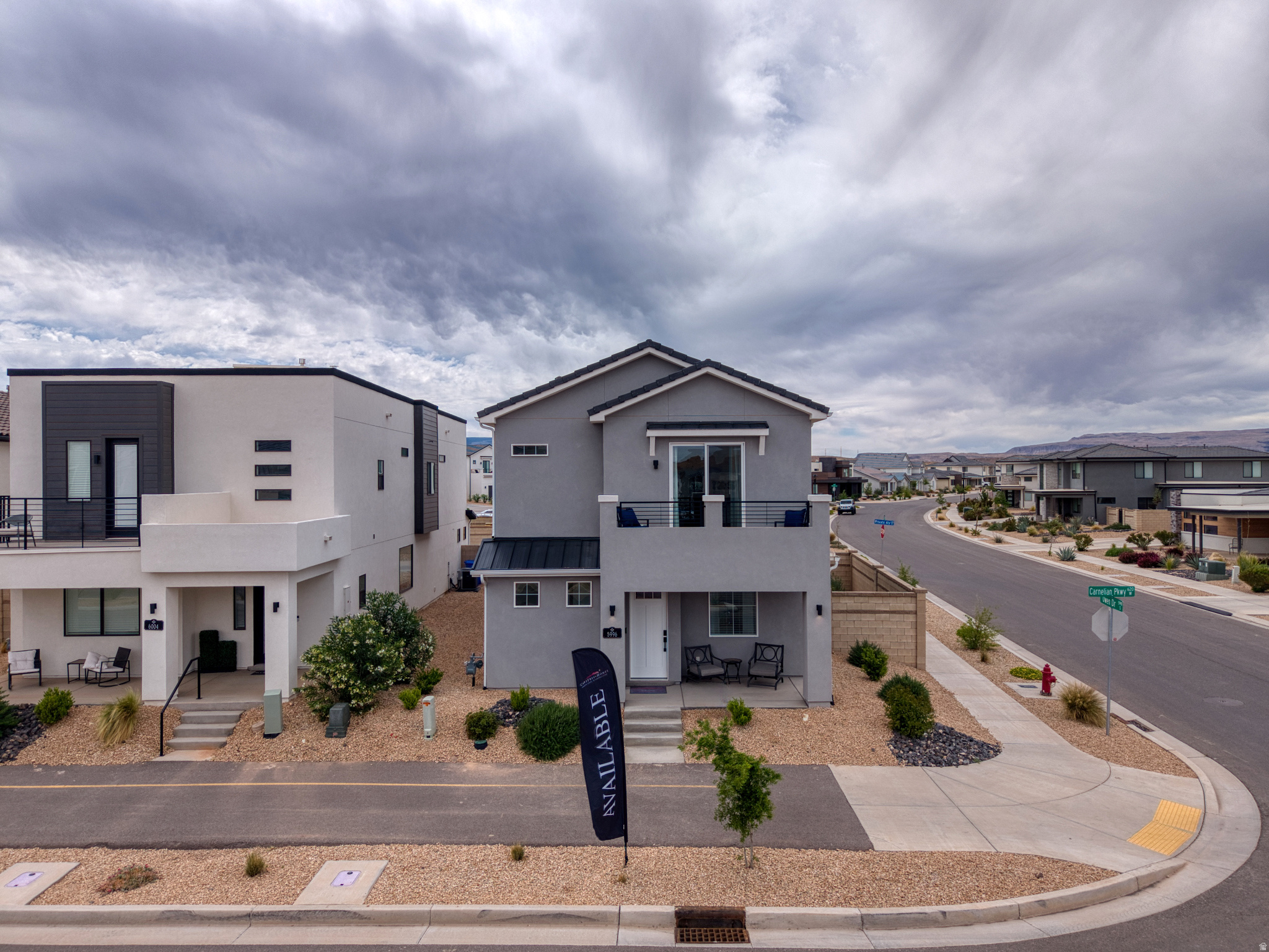 MODEL HOME!! (Furniture not included) This beautiful home features the Syracuse DT + Balcony floor plan, thoughtfully designed and built by Carefree Homes--Southern Utah's trusted builder. Carefree delivers service that exceeds our home buyers expectations before, during and after the sale! Conveniently located near major highways and just minutes from exciting new commercial developments, this home is perfect for both work and leisure. Highlights include durable 2x6 construction, stylish 2'' faux wood blinds, epoxy-coated garage floors, a fully landscaped yard, quartz countertops, and soft close drawers. More... Nestled within a vibrant and growing community, you'll enjoy a wealth of amenities right at your doorstep, including a state-of-the-art lagoon and all year long heated pool with several pickleball courts, perfect for outdoor fun and relaxation with family, friends and neighbors. Call today for a showing or for more information about Southern Utah's unique community, Desert Color.
