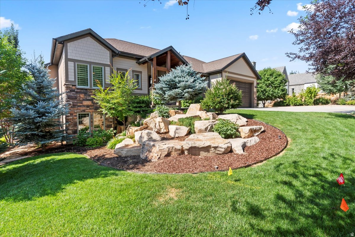 Welcome to your MOUNTAIN RETREAT in charming Midway UT  where small town warmth meets WORLD-CLASS RECREATION.  Whether you're seeking a full-time residence or second home, this one delivers.  ***Located in a premium NORTH MIDWAY LOCATION, you'll enjoy direct access to over 20 miles of HIKING and BIKING TRAILS just a few steps off your driveway with PANORAMIC MOUNTAIN and VALLEY VIEWS.  After a day of skiing at DEER VALLEY EAST VILLAGE  just 15 minutes away  soak in your own private hot tub, relax by the natural gas fire pit or enjoy summer evenings gazing at the stars in this DARK SKY community.  You'll also enjoy quick access to many other outdoor adventures, such as, blue-ribbon FLY FISHING, snowmobiling, 2002 OLYMPIC VENUE NORDIC SKIING, two nearby reservoirs perfect for boating, fishing, paddle boarding and swimming, ATV trails, horseback riding and three PREMIUM GOLF courses.  ***This beautiful home offers MAIN LEVEL LIVING with 5 bedrooms and 6 baths, lots of natural light, a covered main level deck, lower-level covered patio and 3-car DEEP GARAGE to store all your adventure gear.  ***Additional highlights include a FULL-WALKOUT BASEMENT with kitchenette that opens to a PROFESSIONALLY LANDSCAPED, outdoor retreat featuring tranquil water feature and paved trails that lead to the community park and stream.  ***With close proximity to PARK CITY and SUNDANCE RESORT, you'll have plenty of options for dining, shopping, wine festivals and more  plus, EASY FREEWAY ACCESS to Salt Lake International Airport.  ***This home is in PRISTINE CONDITION and a must see to truly appreciate the incredible location, expansive views and gorgeous landscaping.  ***Square footage figures are provided as a courtesy estimate only.  Buyer is advised to obtain an independent measurement.
