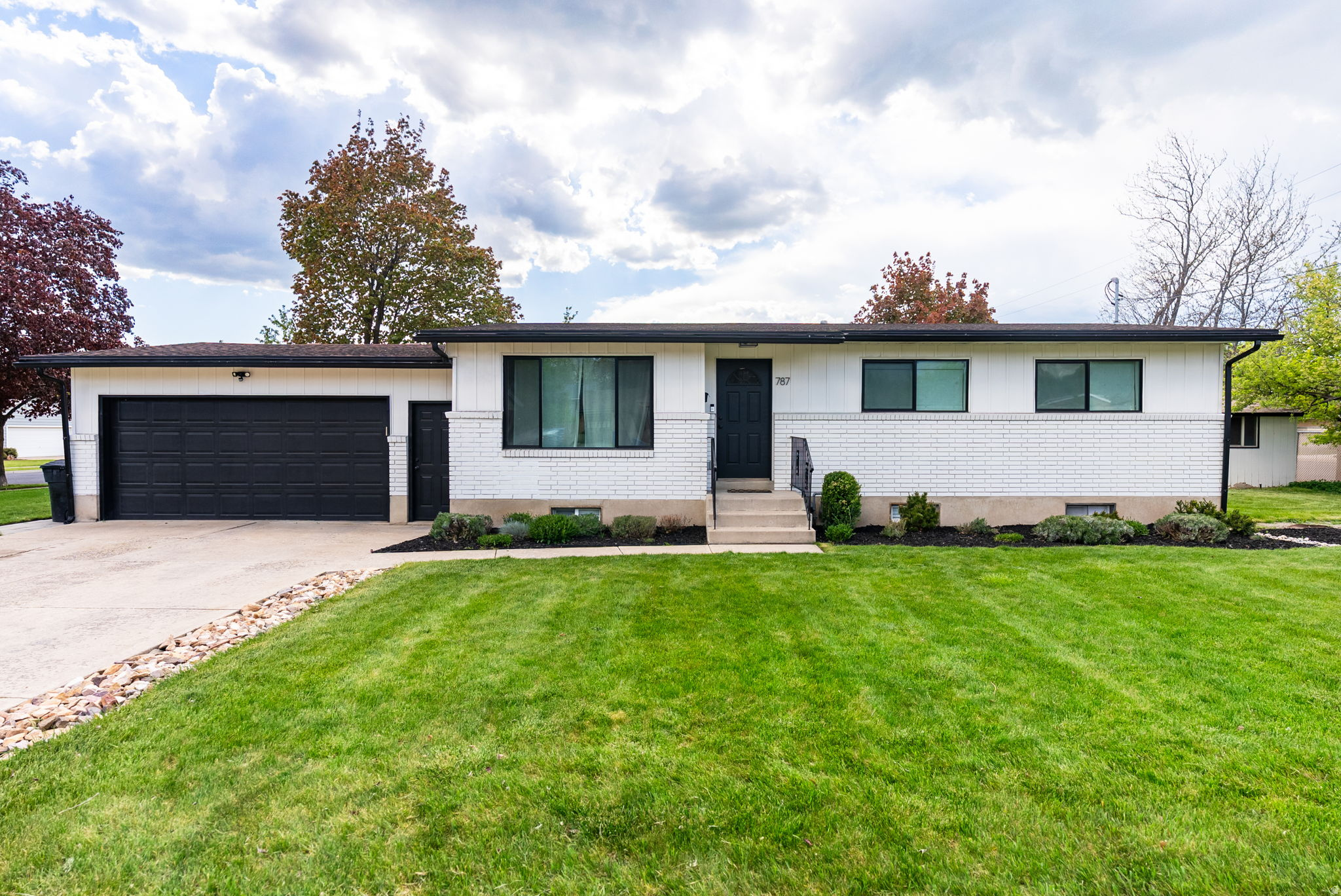 Location plus income potential, this one checks all the boxes. Just minutes from USU, this beautifully updated home features bright, modern living spaces and a fully equipped basement ADU, perfect for rental income or added flexibility. Nestled in a quiet neighborhood with a great yard and mountain views, it's the ideal blend of comfort and opportunity.