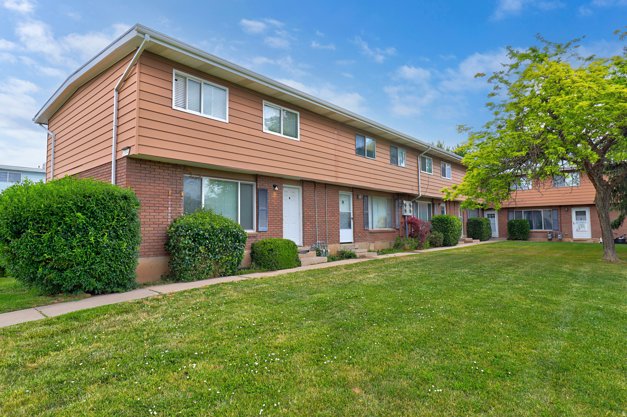 First time homebuyer or investor opportunity to OWN this awesome home, featuring updated white cabinets, granite counters, spacious bedrooms, gas stove fireplace, fantastic patio and TWO car carport.  Property NEEDS new evaporative cooler and paint. Priced to sell AS IS.