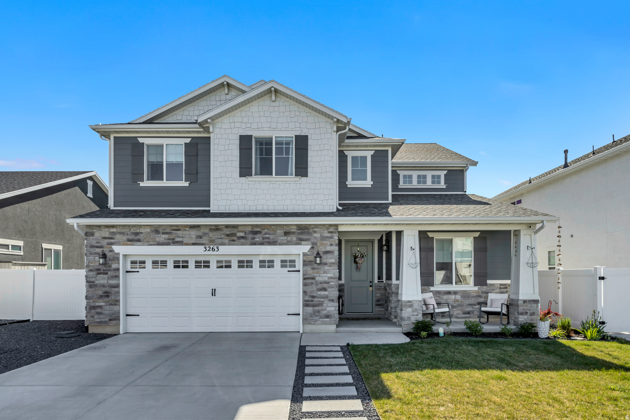 This stunning 5-bedroom, 3-bathroom home offers 3,006 sq. ft. of beautifully upgraded living space on a professionally landscaped .13-acre lot. Built in 2022, this highly sought-after Woodside Homes Hampton Estates floor plan combines modern design with comfort and functionality throughout.  The main level features an open-concept layout with 9-foot ceilings, a spacious great room, and a gorgeous fireplace complete with a custom mantle, built-in cabinets, and shelving. Automated blinds on the main level add both convenience and a modern touch. The kitchen is truly the heart of the home, featuring quartz countertops, a stylish backsplash, ceiling-height cabinetry, and an oversized island perfect for meal prep, entertaining, and gathering with family and friends.  Upstairs, you'll find a versatile loft space along with four bedrooms, including an upgraded primary suite with a beautifully designed bathroom. Step outside to enjoy the large covered patio overlooking the fully fenced and landscaped backyard - the perfect space for relaxing or entertaining year-round.