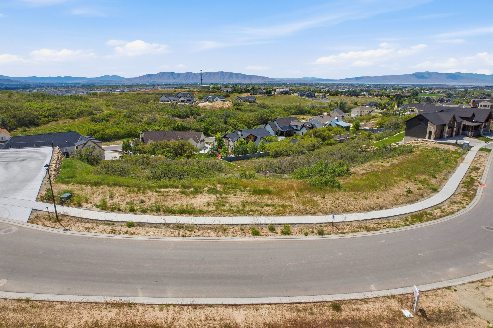 Established at the top of a quiet cul-de-sac, this exceptional .80- acre homesite offers breathtaking mountain, valley and lake views in every direction. One of the highest lots in the area, this rare property provides the perfect setting to build a custom dream home with unmatched privacy, elevation and scenery. Enjoy peaceful surroundings, stunning sunsets, mountain trails and the feeling of being tucked away while still conveniently close to town amenities. A truly premier lot with endless possibilities. Owner is Agent.