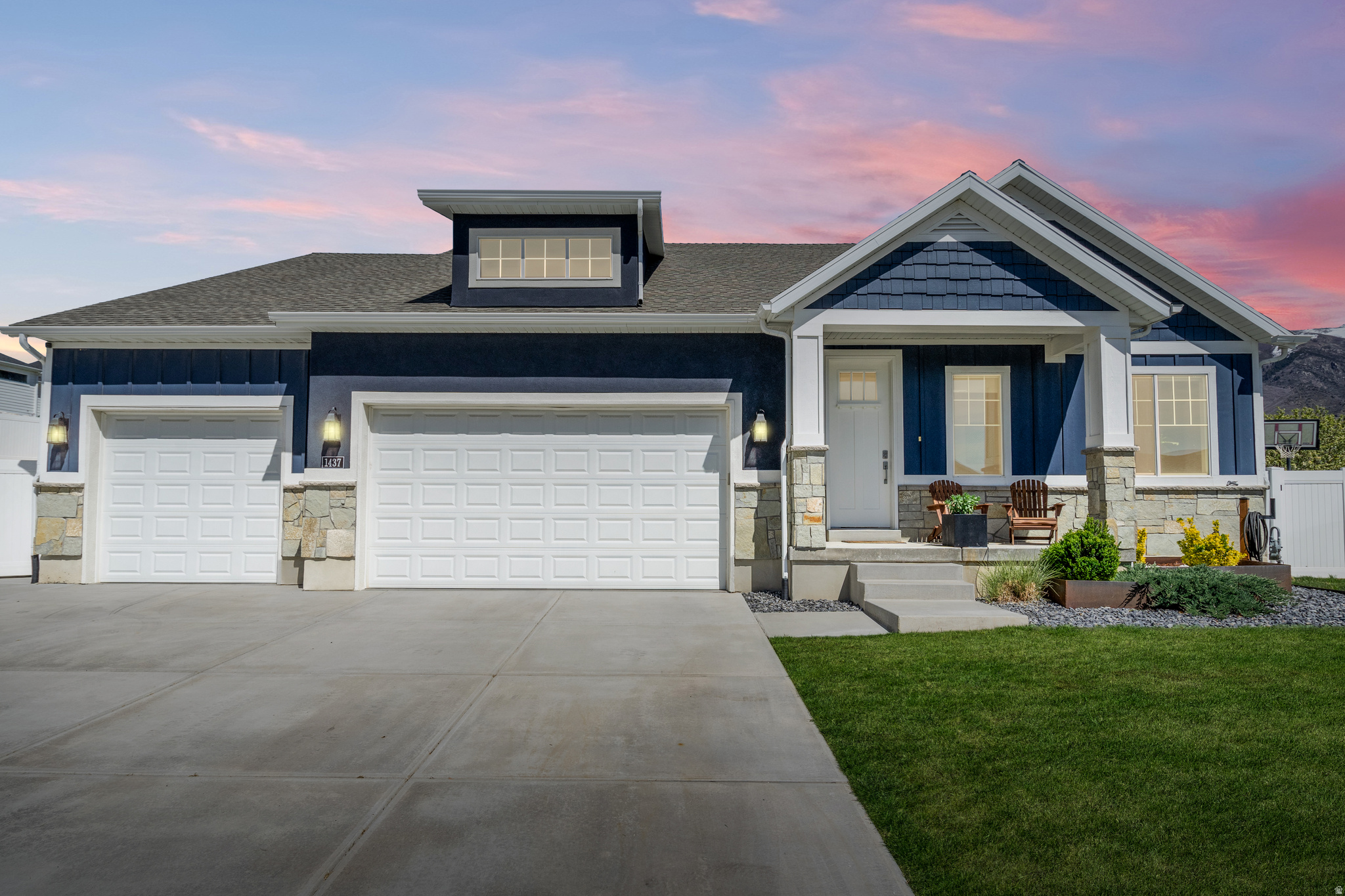 Tucked away at the end of a quiet East Layton cul-de-sac, this exceptional rambler offers the perfect blend of comfort, space, and stunning mountain views. Ideally located within walking distance to the South Fork Trail and just minutes from Highway 89, you'll enjoy both peaceful surroundings and convenient access to commuting and outdoor recreation.  Situated on one of the largest lots in Eastridge Park, this home provides ample room for all your needs-including a spacious 3-car garage with tall ceilings, extra storage, and plenty of additional parking for toys and trailers. Inside, abundant natural light pours through oversized windows, highlighting the open-concept layout with vaulted ceilings and a cozy fireplace in the great room.  The well-designed kitchen is perfect for entertaining, featuring double ovens, a gas cooktop, generous counter space, abundant cabinetry, and a large dining area that opens to an oversized covered patio-ideal for relaxing and taking in the breathtaking mountain views.  The owner's suite is a true retreat, complete with a beautiful accent wall, vaulted ceilings, a large walk-in closet, and a luxurious ensuite bath with a soaking tub, separate glass shower, and double vanity. The main level also offers a versatile office or formal living space.  Downstairs, the fully finished basement expands your living and entertaining options with a massive family room, dedicated theater room, exercise area, roughed-in kitchenette, and extensive storage space.  Outside, enjoy a fully fenced and landscaped yard with plenty of room to play, garden, or unwind. This is a rare opportunity to own a premier lot in a sought-after neighborhood-don't miss your chance to call this home!