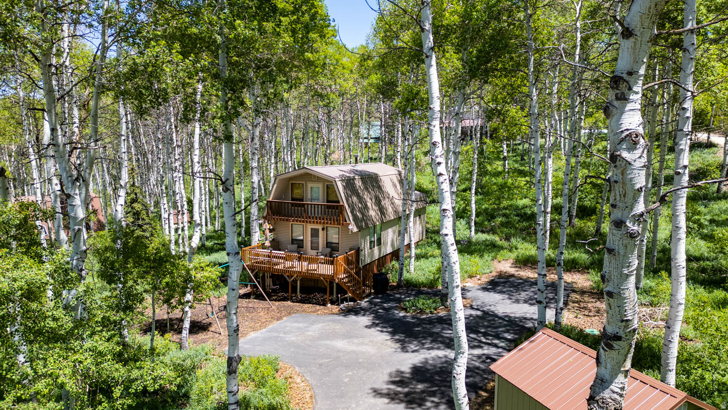 Perfect weekend retreat or easy Timber Lakes full time living! Nestled in the aspens with wild flowers this mid mountain easy to get to cabin is pure perfection. Turn Key and furnishings included. Offering 3 bedrooms, 3 bathrooms, functionable kitchen, and beautiful outdoor living space with a large deck on the front and a gazebo covered deck in the back yard area. Large  shed provides ample storage to keep your belongings protected. Asphalt driveway makes snow removal a breeze. Timber Lakes offers many great amenities including full time security, snow removal of roads, many lakes and ponds, playground & picnic areas, hiking/biking trails and more! Close proximity to Heber City for shopping and schools. Timber Lakes boarders forest service land with snowmobile/cross country skiing access in the winter and hiking/biking access in the summer. Buyer to verify all.