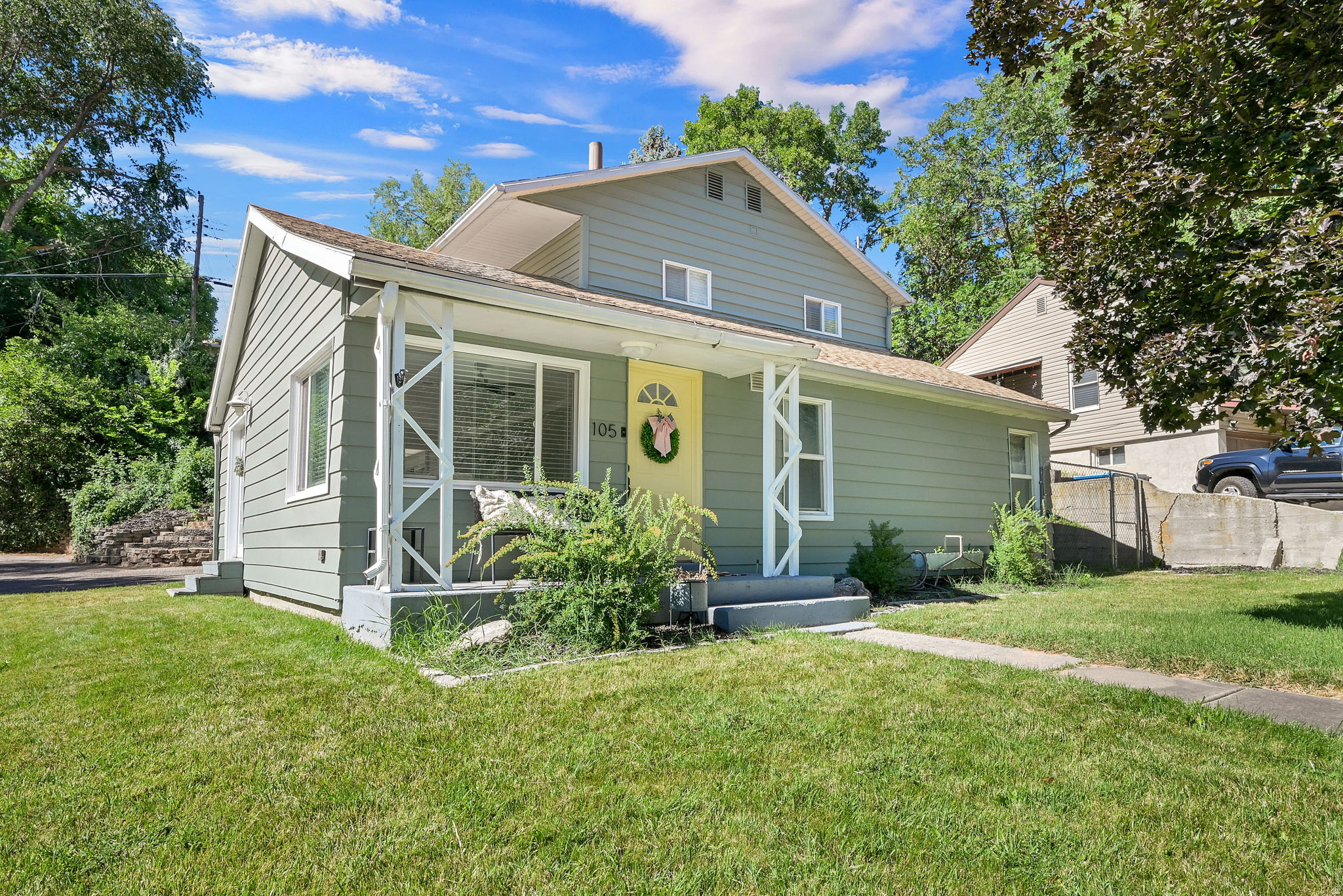 This could be your perfect first home or a smart rental option. With minimal yard work, updated paint, carpet and home finishes, this house is looking for its next owner. Recently restructured the upstairs hallway to make an official 2nd bedroom with a deep closet as well as a larger walk in closet and privacy for the large owners bedroom that has it's own ensuite. Nicely located next to the Ogden Country Club, but not in the path of rogue golf balls, this cute home is also close to downtown shopping and eateries. An attached garage keeps your 2 cars dry and warm in the winter, the tankless water heater provides plenty of hot water on demand, not to mention the lower monthly electric bills due to the solar panels. (Yes, panels are paid off and yours to enjoy!)  All appliances will remain with the home including the refrigerator, washer, and dryer.   Square footage figures are provided as a courtesy estimate only and were obtained from county records.  Buyer is advised to obtain an independent measurement.